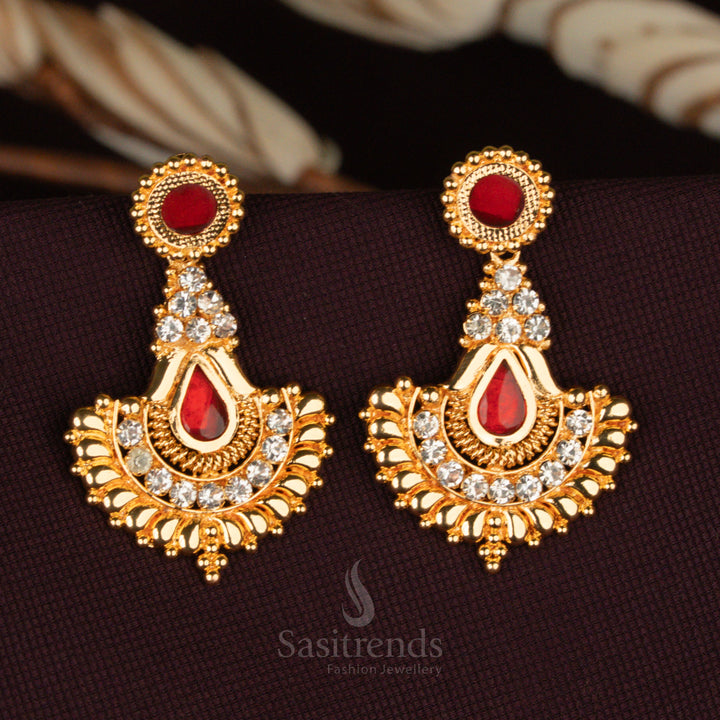 Temple wear Hanging Palakka Earrings, showcasing a graceful tear-drop design with gold craftsmanship and premium AD stone accents – Sasitrends