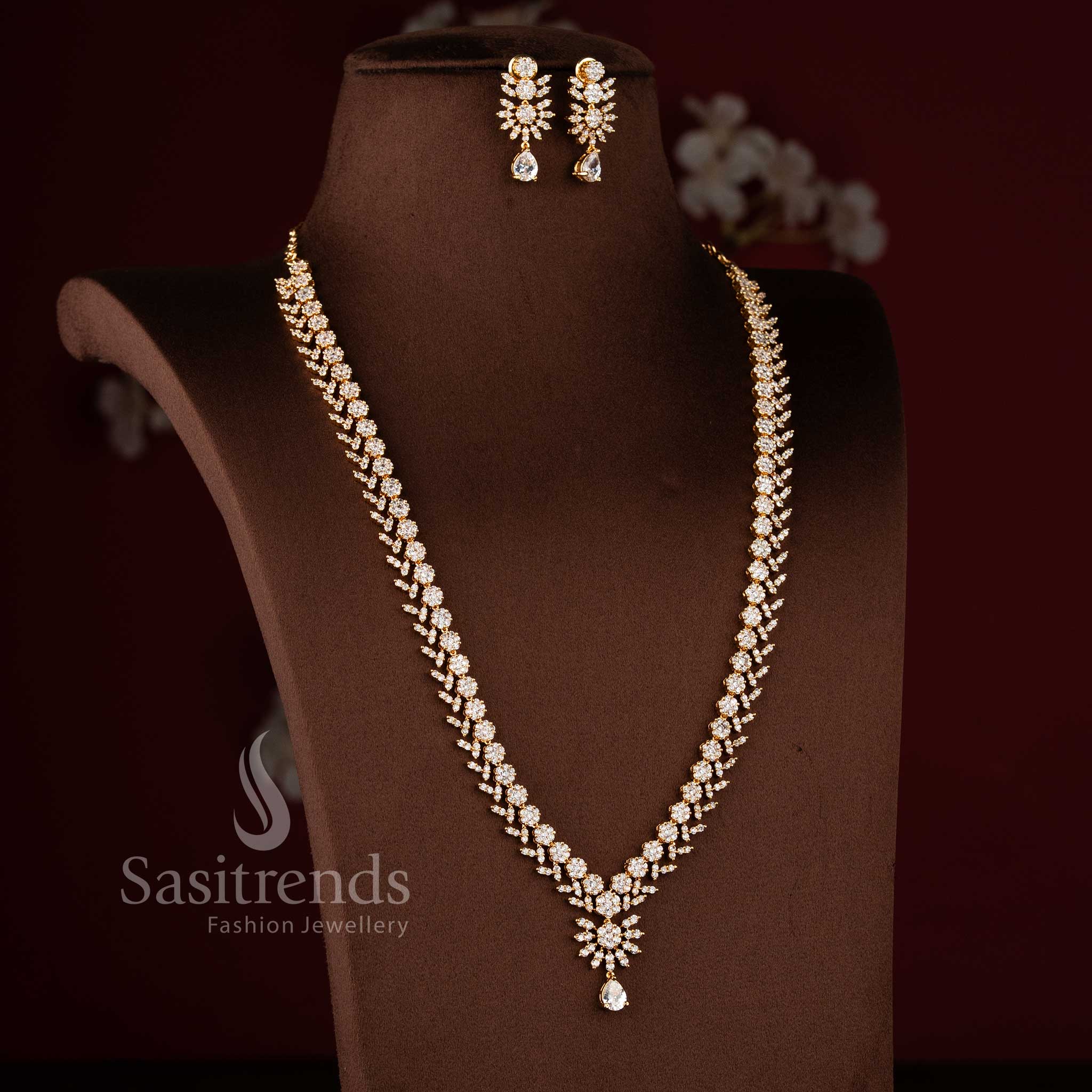 Stylish micro gold plated wedding jewellery set with brilliant white American Diamond clusters.