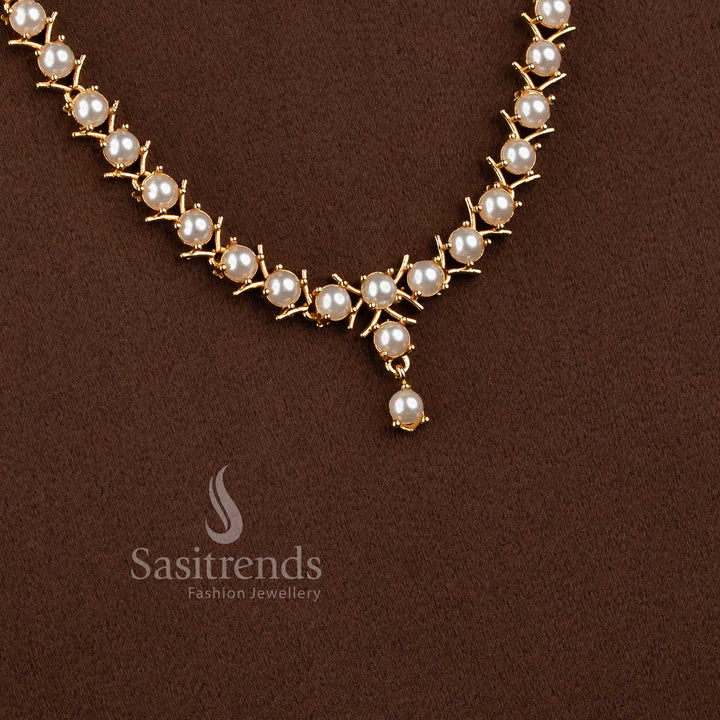 Traditional micro gold plated pearl long necklace set with American Diamond accents.