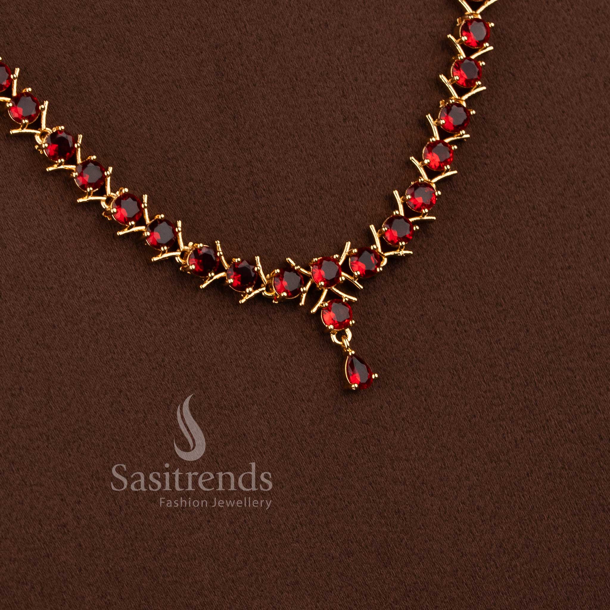 Beautiful micro gold plated American Diamond red stone long necklace set by Sasitrends.
