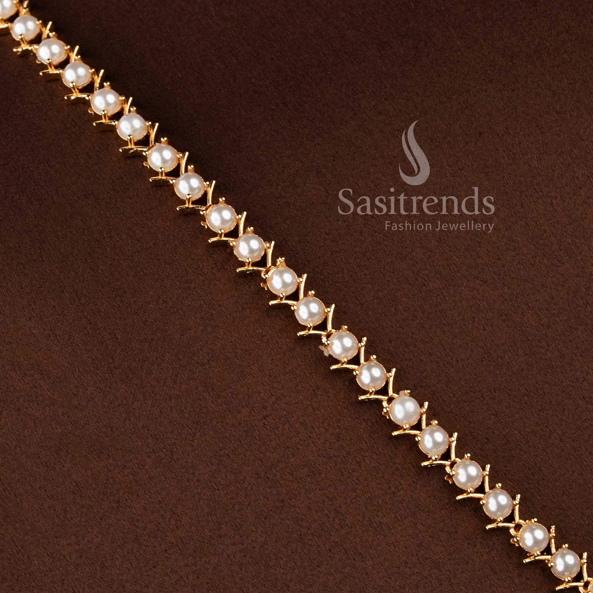 Elegant pearl long necklace jewellery set with sparkling AD stones for women.