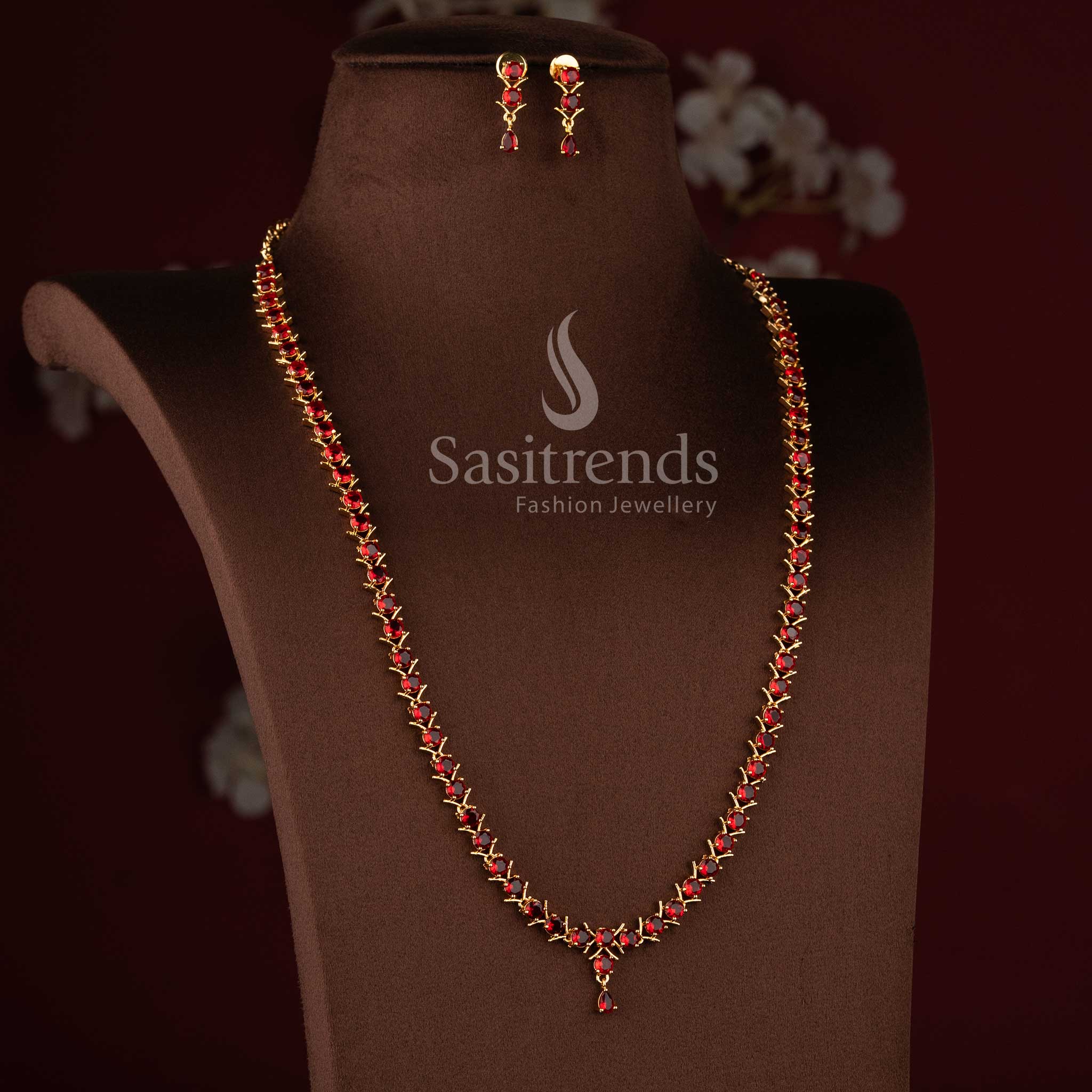 Traditional micro gold plated red stone long necklace set with American Diamond accents.