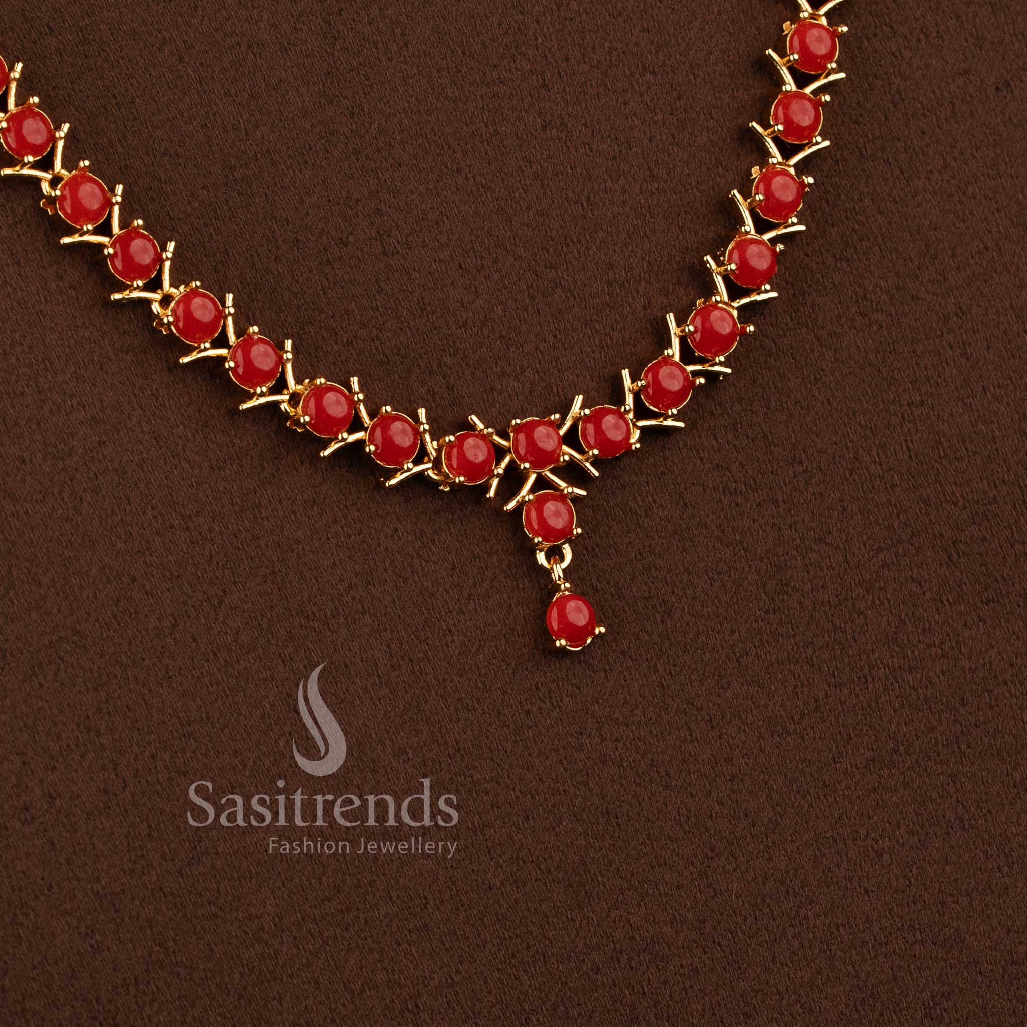 Elegant pavalam stone long necklace jewellery set with sparkling AD stones for women.