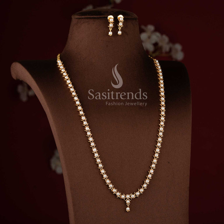 Traditional micro gold plated pearl long necklace set with American Diamond accents.