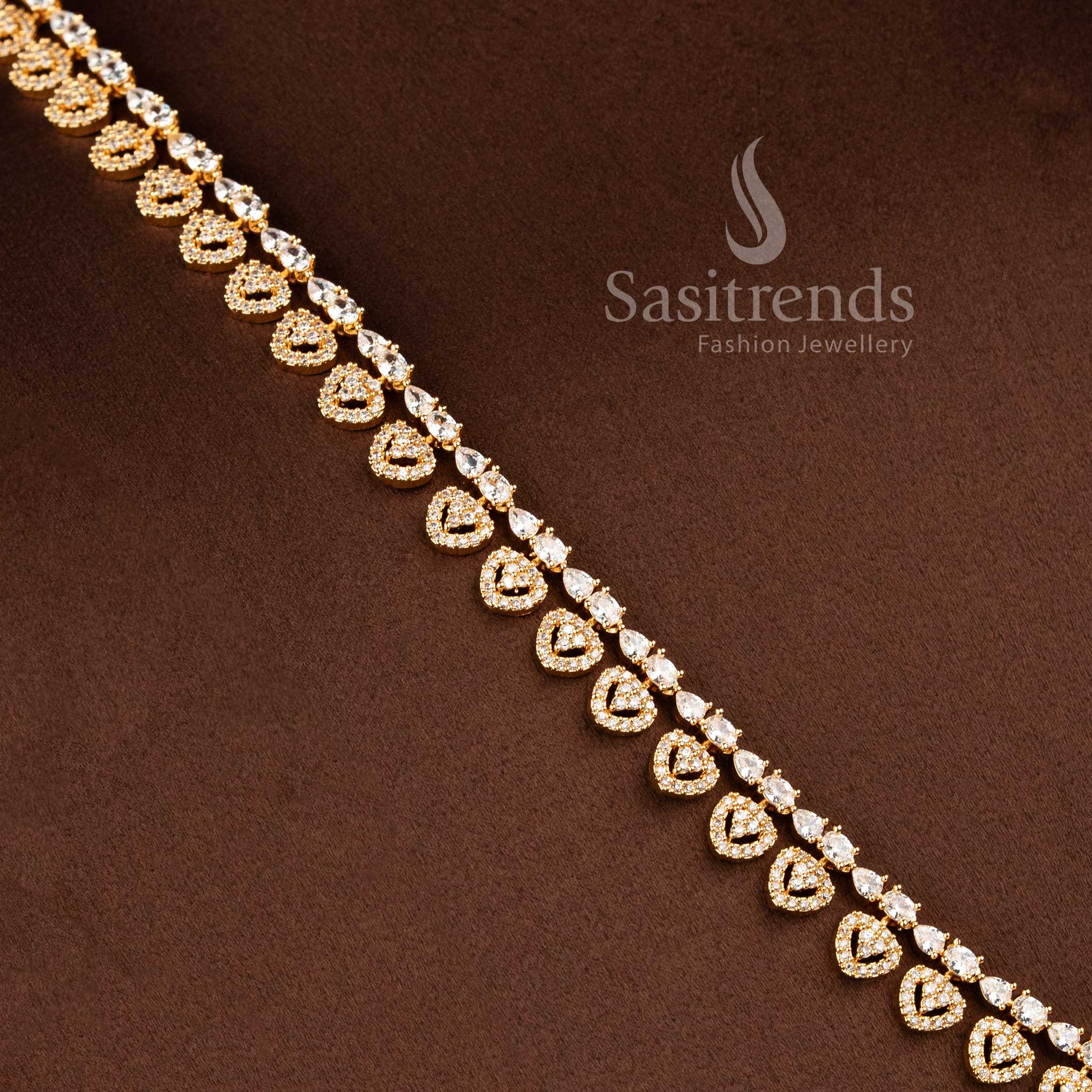 Elegant heart motif AD long necklace jewellery set with matching earrings.
