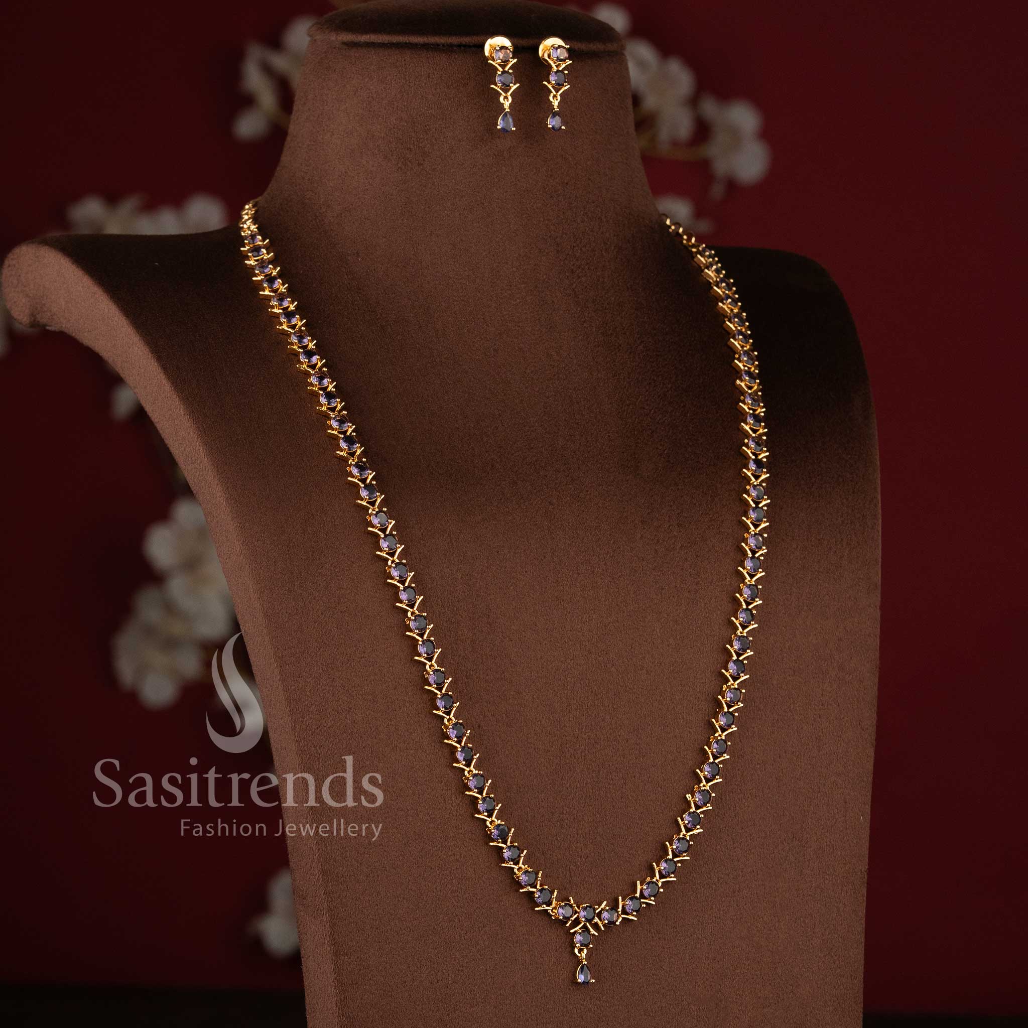 Elegant purple stone long necklace jewellery set with sparkling AD stones for women.