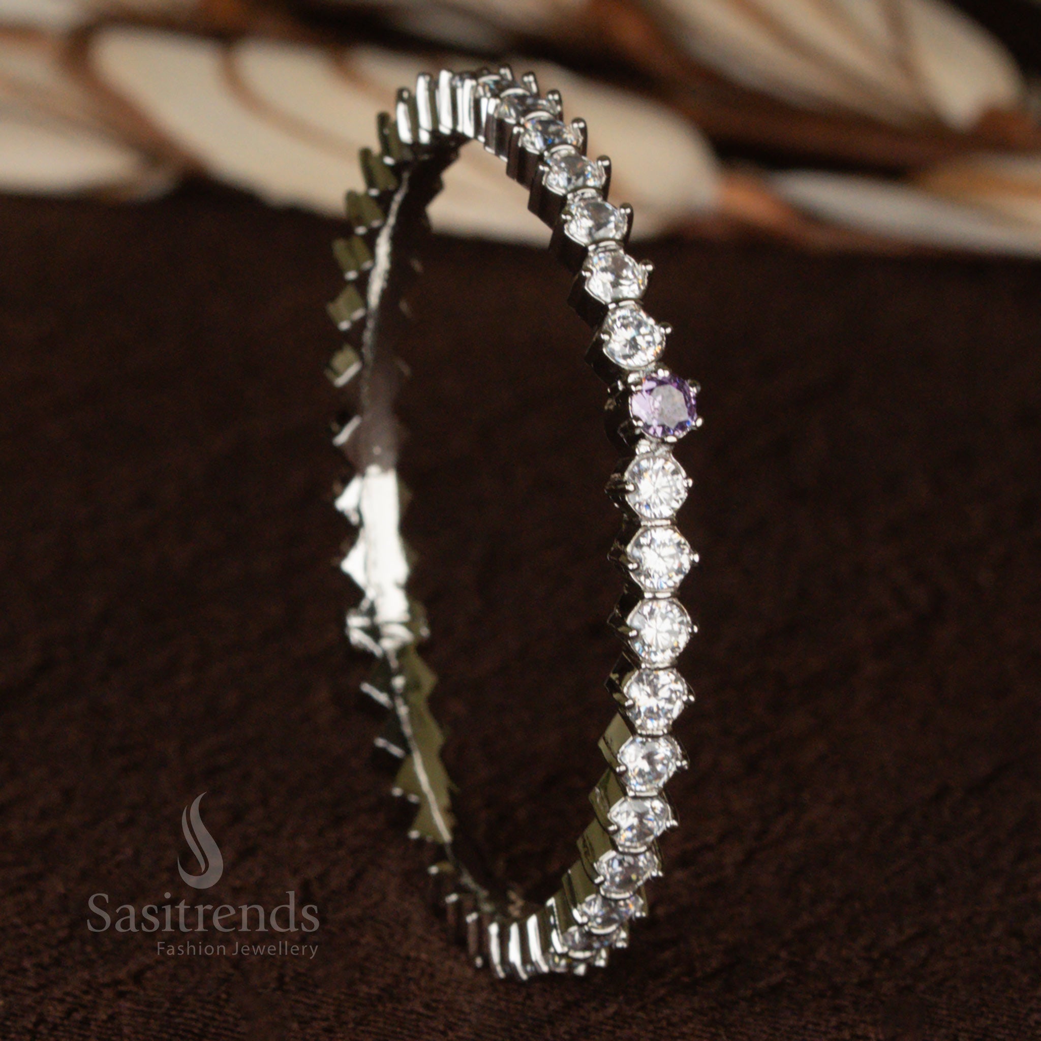 Royal rhodium silver plated bracelet bangle with deep purple stones, inspired by artistic floral motifs and enriched with American diamond brilliance - Sasitrends