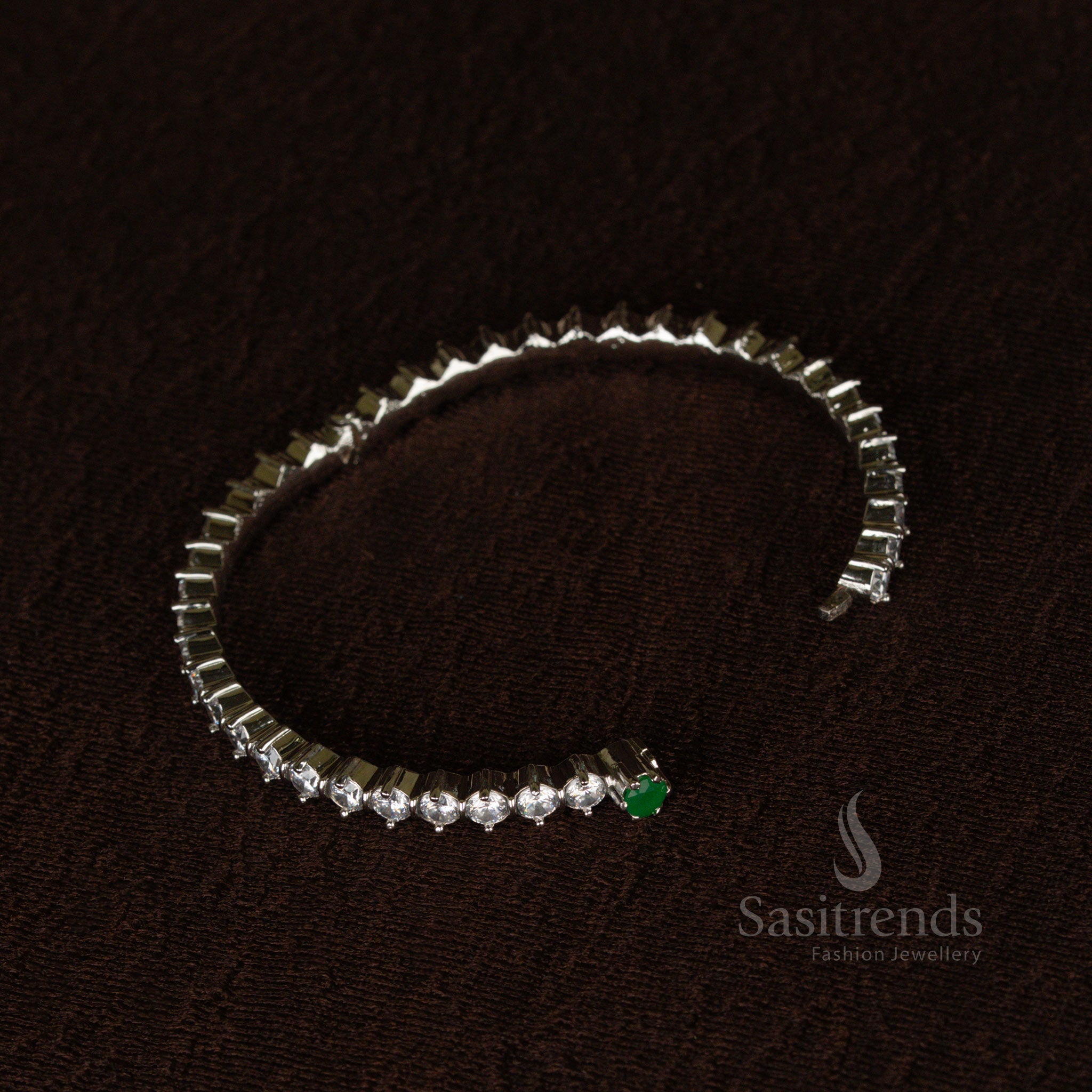 Ethereal rhodium finish openable bracelet bangle with deep green stones, meticulously designed for an elegant and graceful appeal - Sasitrends