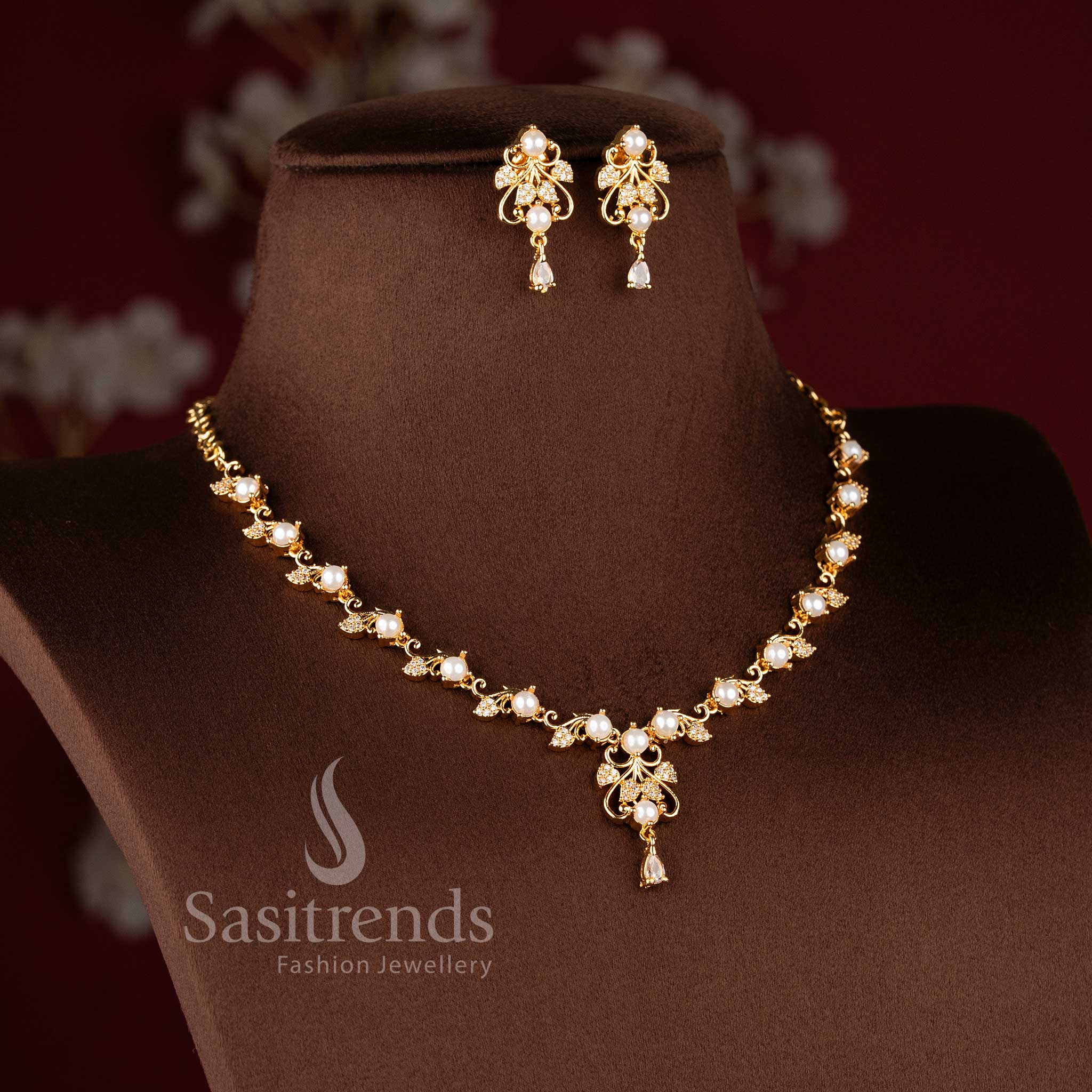 Stylish floral vine AD necklace jewellery set with pearl accents for women.