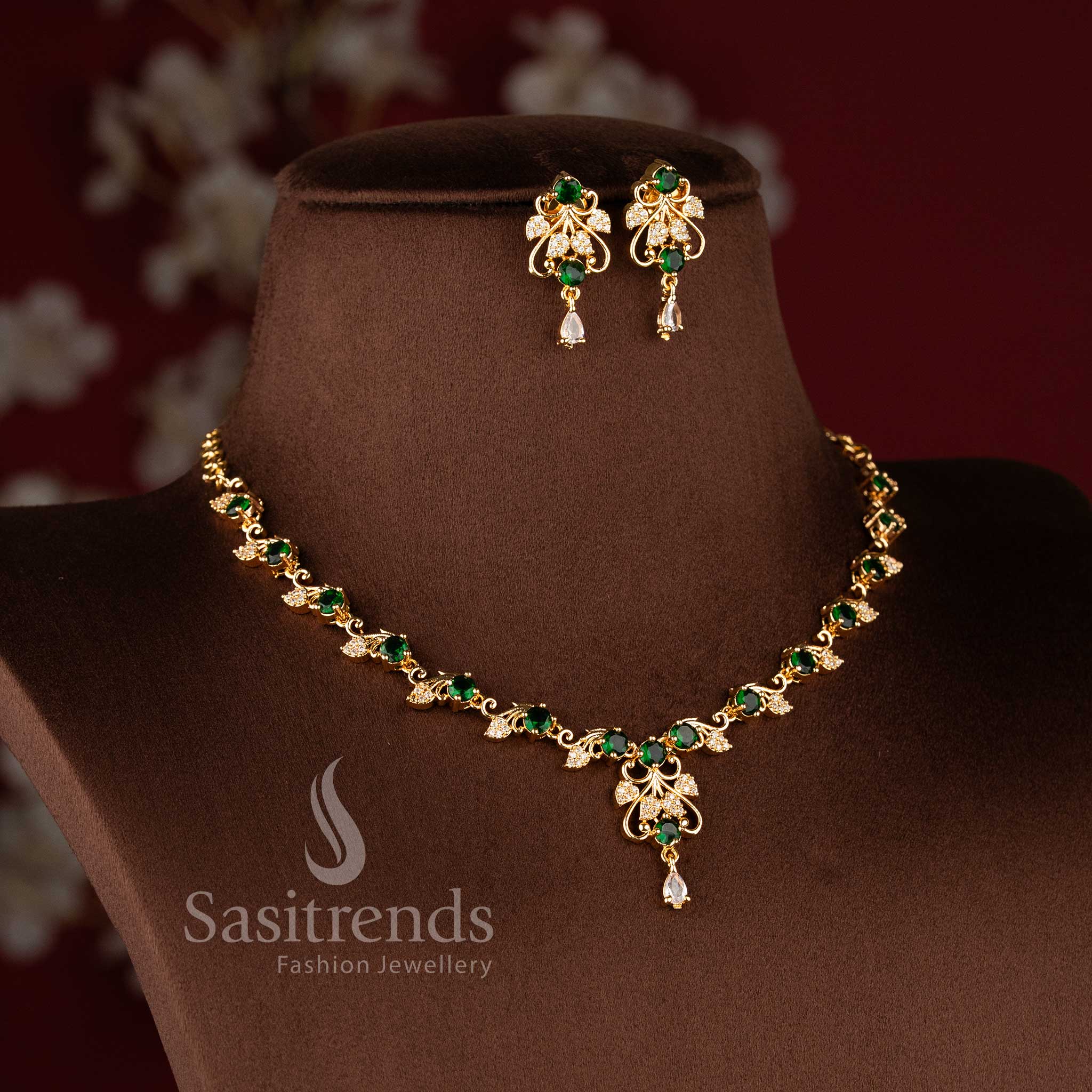 Traditional micro gold plated green stone necklace set with sparkling American Diamonds.