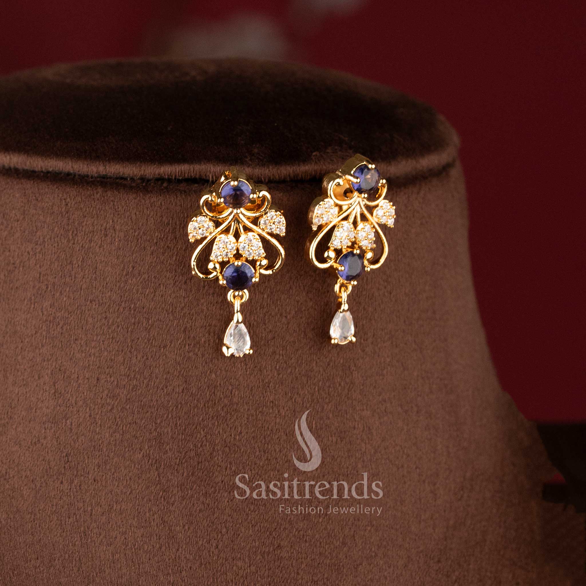Elegant blue stone micro gold plated necklace set with floral vine design.