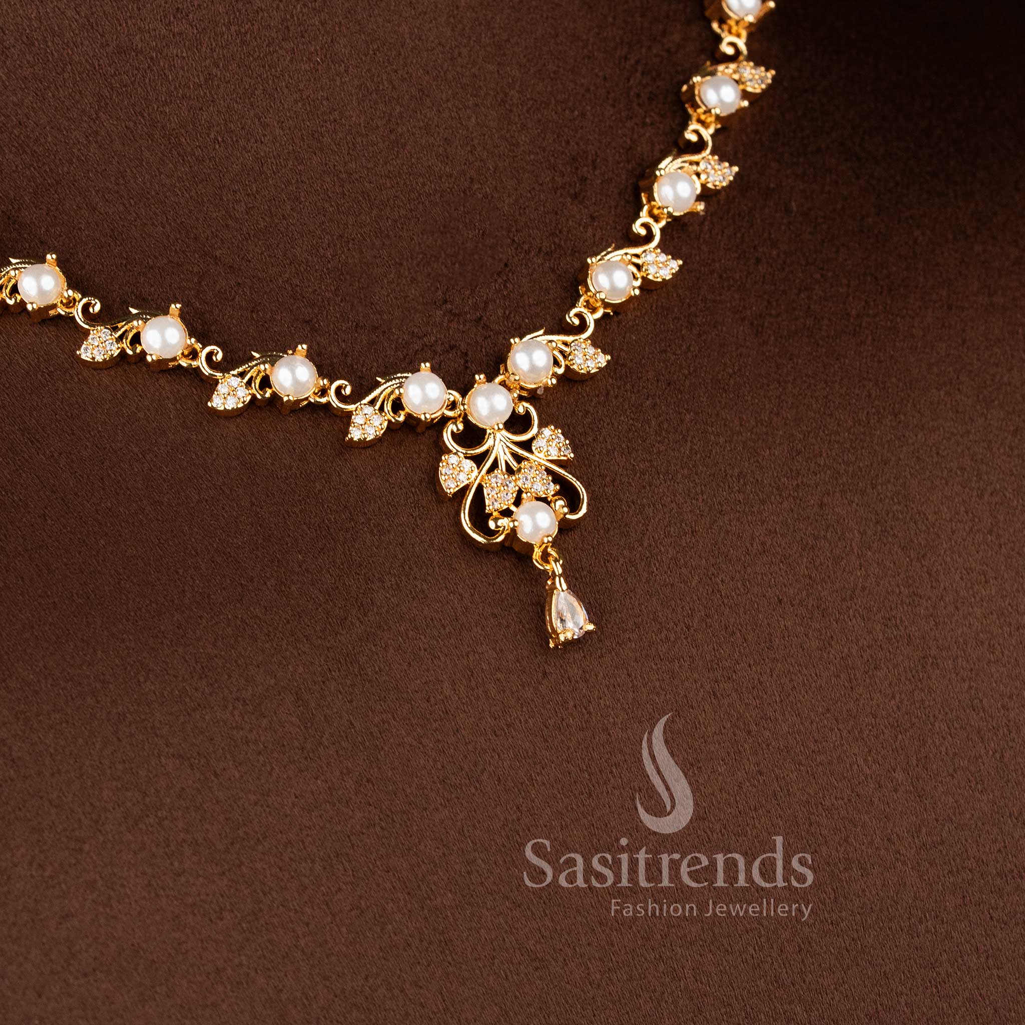 Traditional micro gold plated pearl necklace set with sparkling American Diamonds.