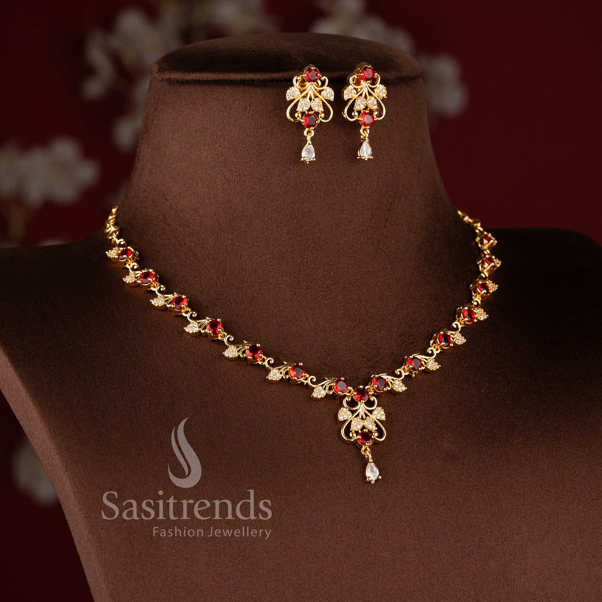 Traditional micro gold plated red stone necklace set with sparkling American Diamonds.