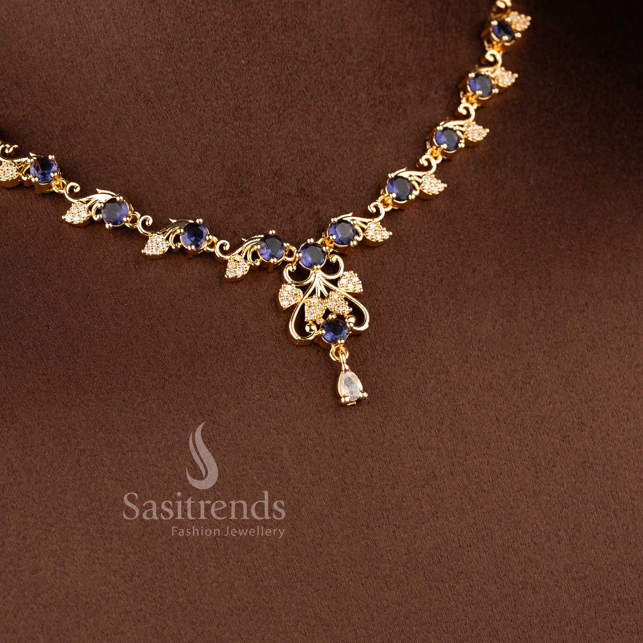 Stylish floral vine AD necklace jewellery set with blue stones for women.