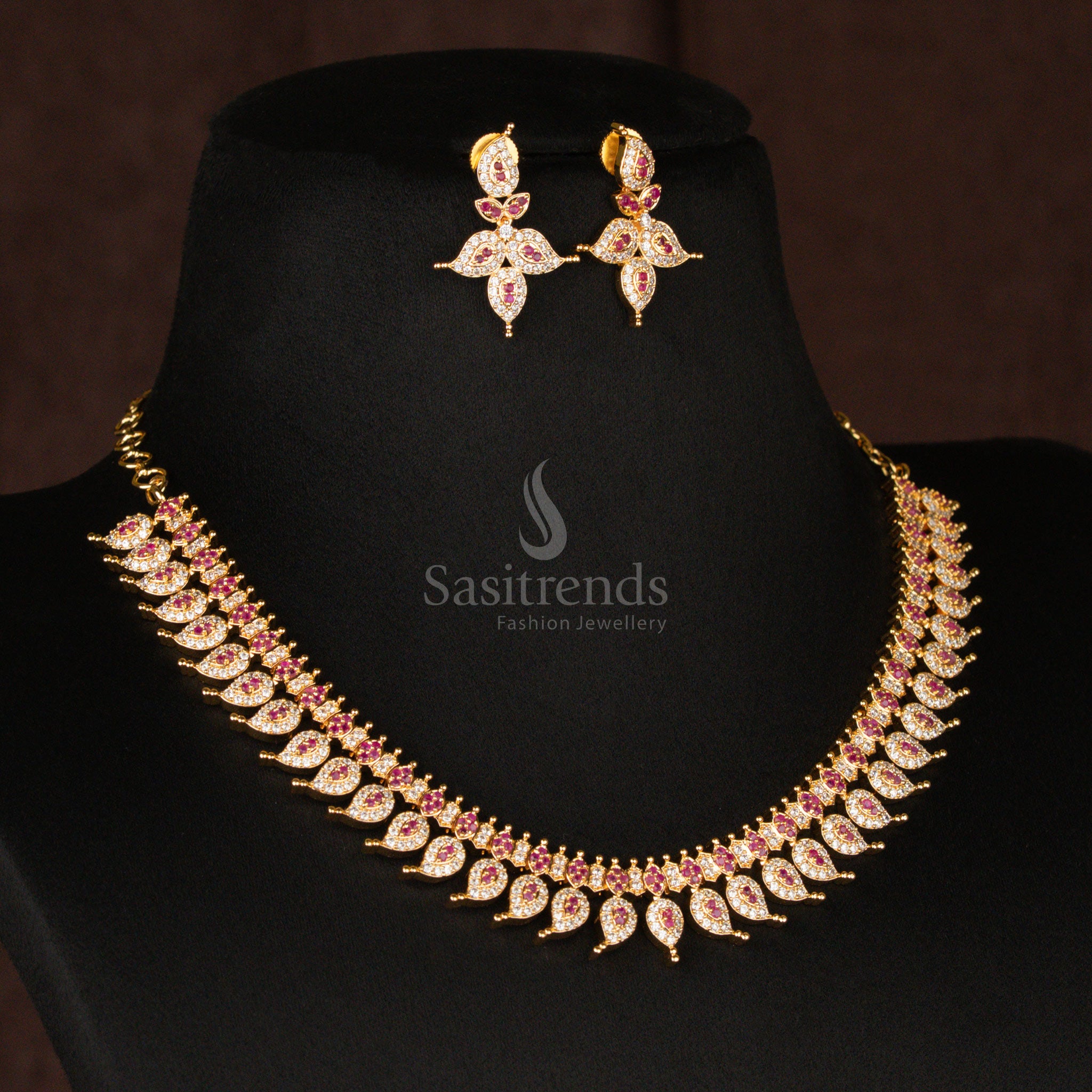 Beautiful American Diamond micro gold plated short haram necklace set, showcasing dazzling white and ruby dual-tone stones, making it a perfect bridal jewellery choice - Sasitrends