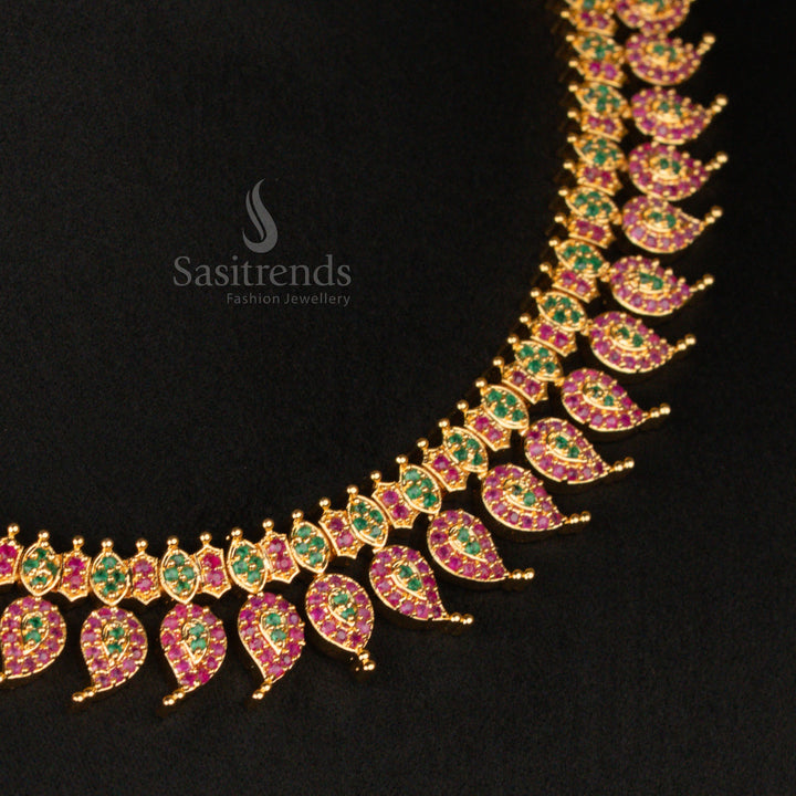 Exquisite ruby-green American Diamond gold plated mango leaf short haram necklace set, intricately crafted in a temple jewellery design for a royal ethnic look - Sasitrends