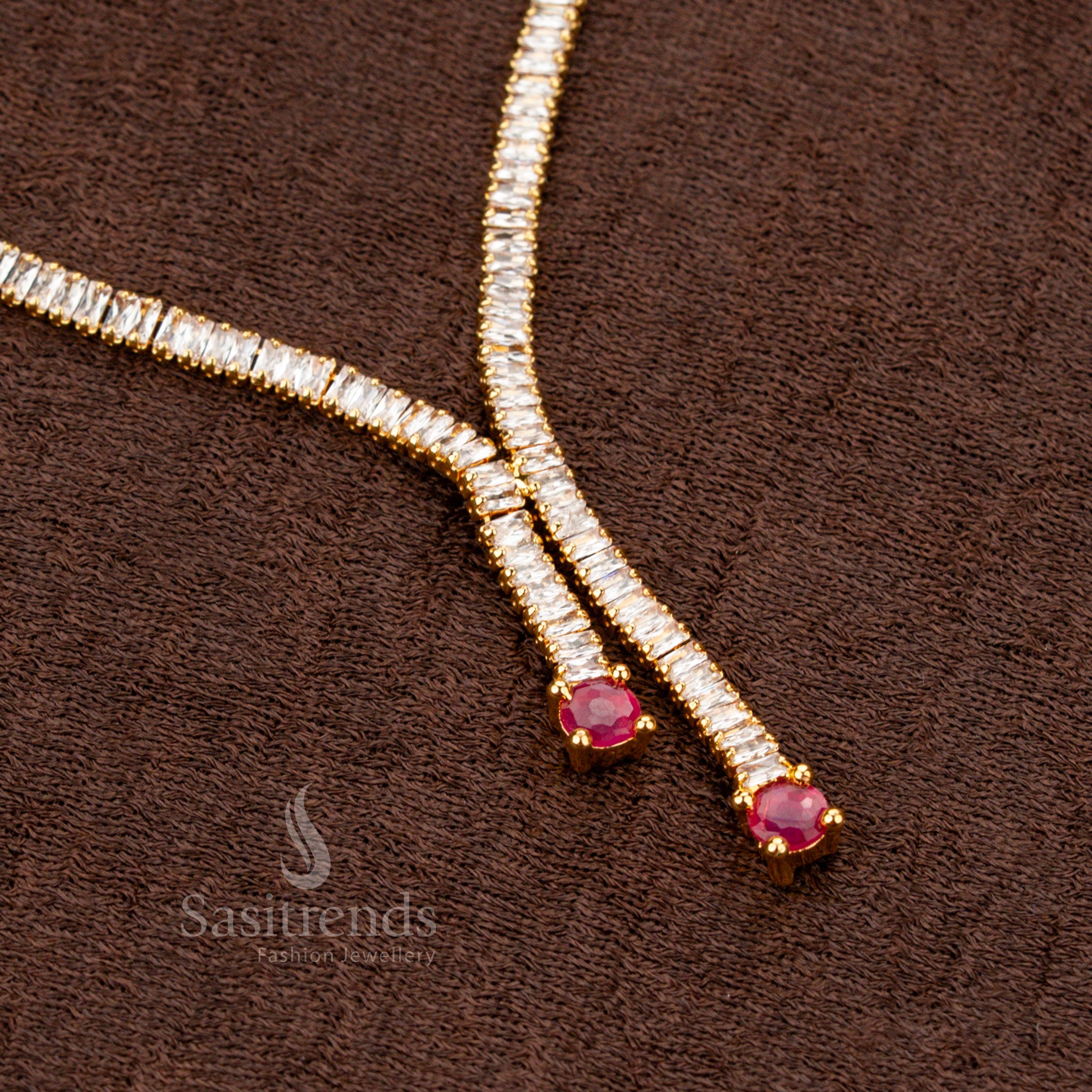 Regal and stylish teen occasion necklace showcasing a mesmerizing combination of white and ruby American Diamond rectangular stones, gracefully set in micro gold plating for an elite touch - Sasitrends