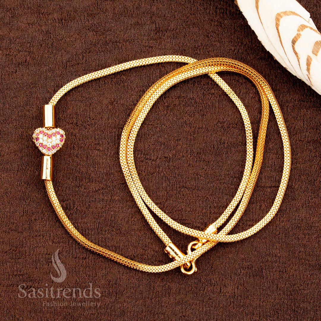 White-ruby Mugappu chain featuring a pink stone heart pendant with micro gold plating, designed for elegant traditional saree looks – sasitrends
