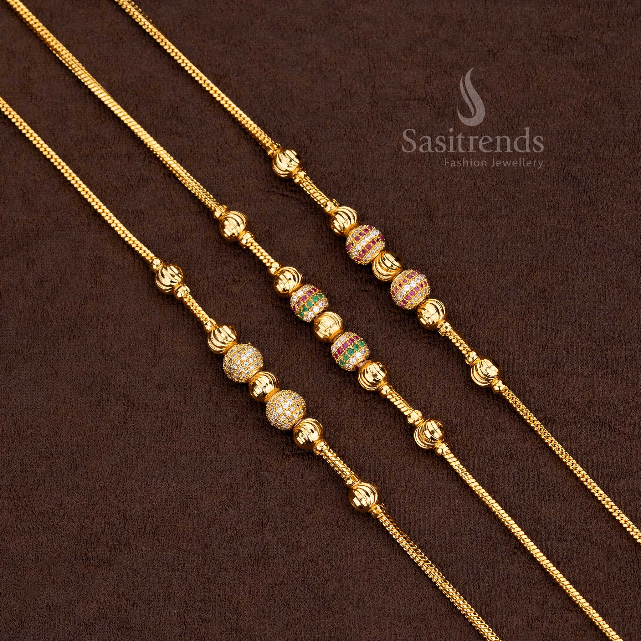 Close-up of a Grand Micro Gold Plated Mugappu Chain, showcasing the intricate ball design with sparkling AD stones, SKU 2576G.
