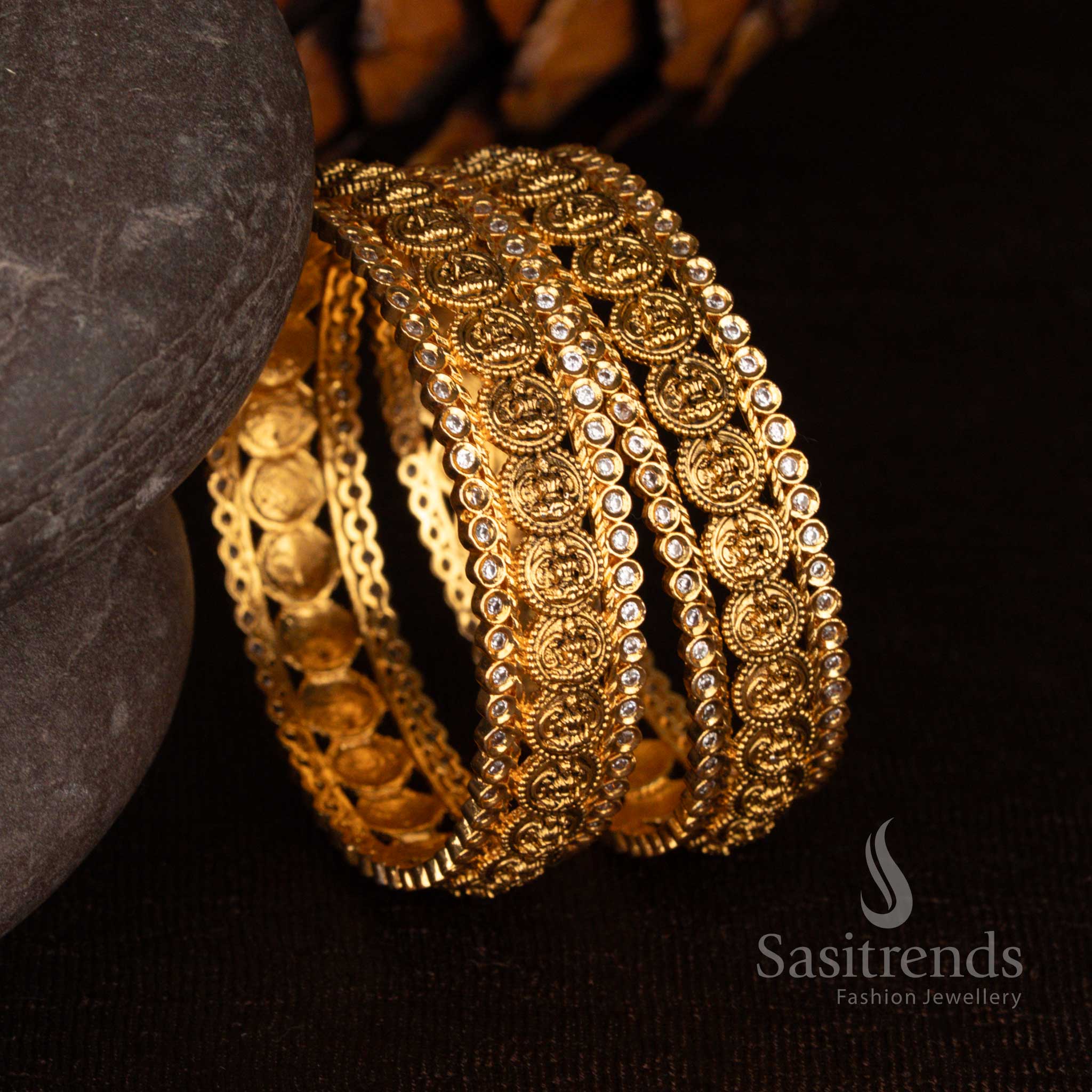 Beautiful Lakshmi Motif American Diamond bangles with intricate temple craftsmanship - Sasitrends