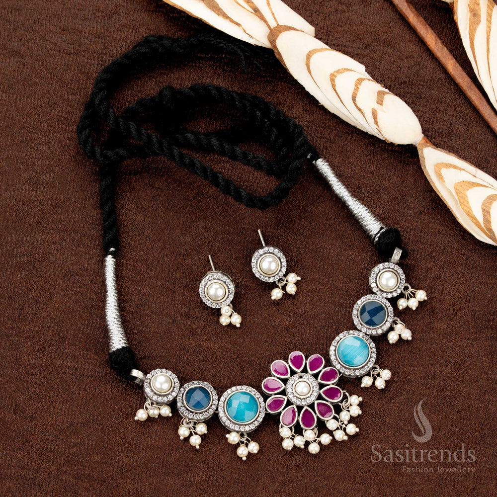 Floral-themed antique oxidised necklace enhanced with pearl dangles and multistone highlights—perfect as Navratri jewellery for cultural sophistication - Sasitrends