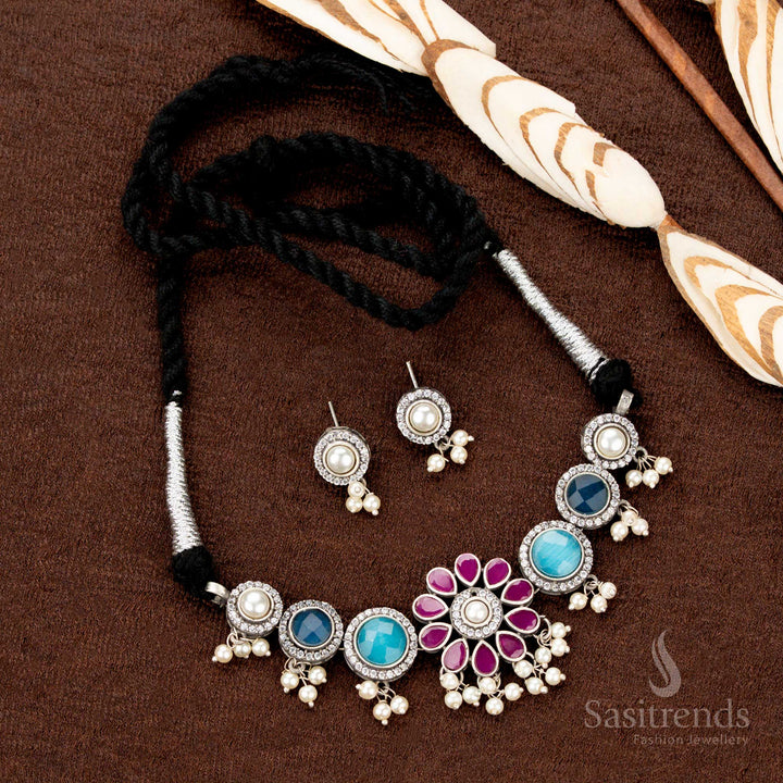 Floral-themed antique oxidised necklace enhanced with pearl dangles and multistone highlights—perfect as Navratri jewellery for cultural sophistication - Sasitrends