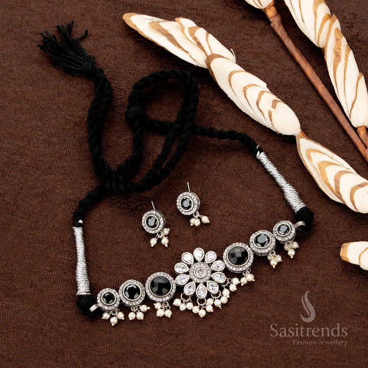 Handcrafted oxidised choker set with multistone inlay, floral detailing, and pearl embellishments—a stunning jewellery piece with a traditional festive vibe - Sasitrends
