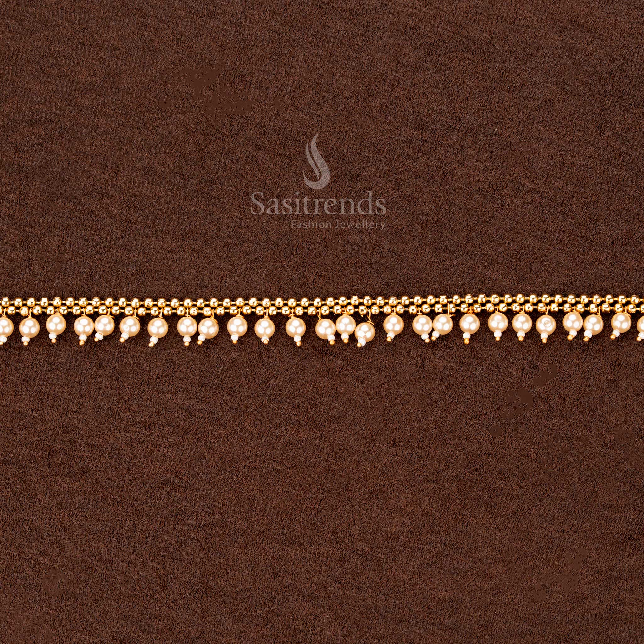 Saree hipbelt with gold plated twin bead lines and dangling pearl hangings - Sasitrends