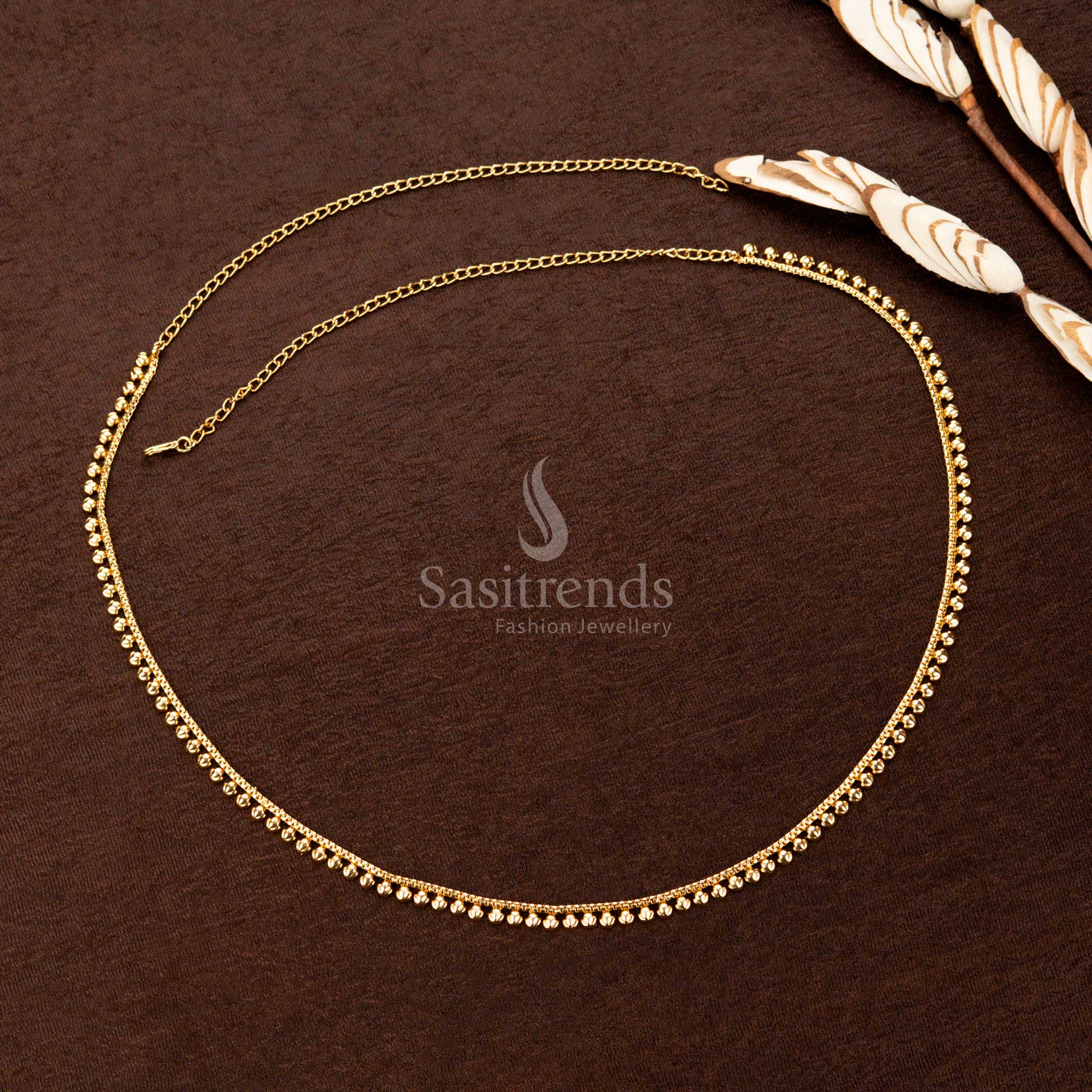 Elegant saree hipbelt featuring detailed spherical hanging motifs - Sasitrends