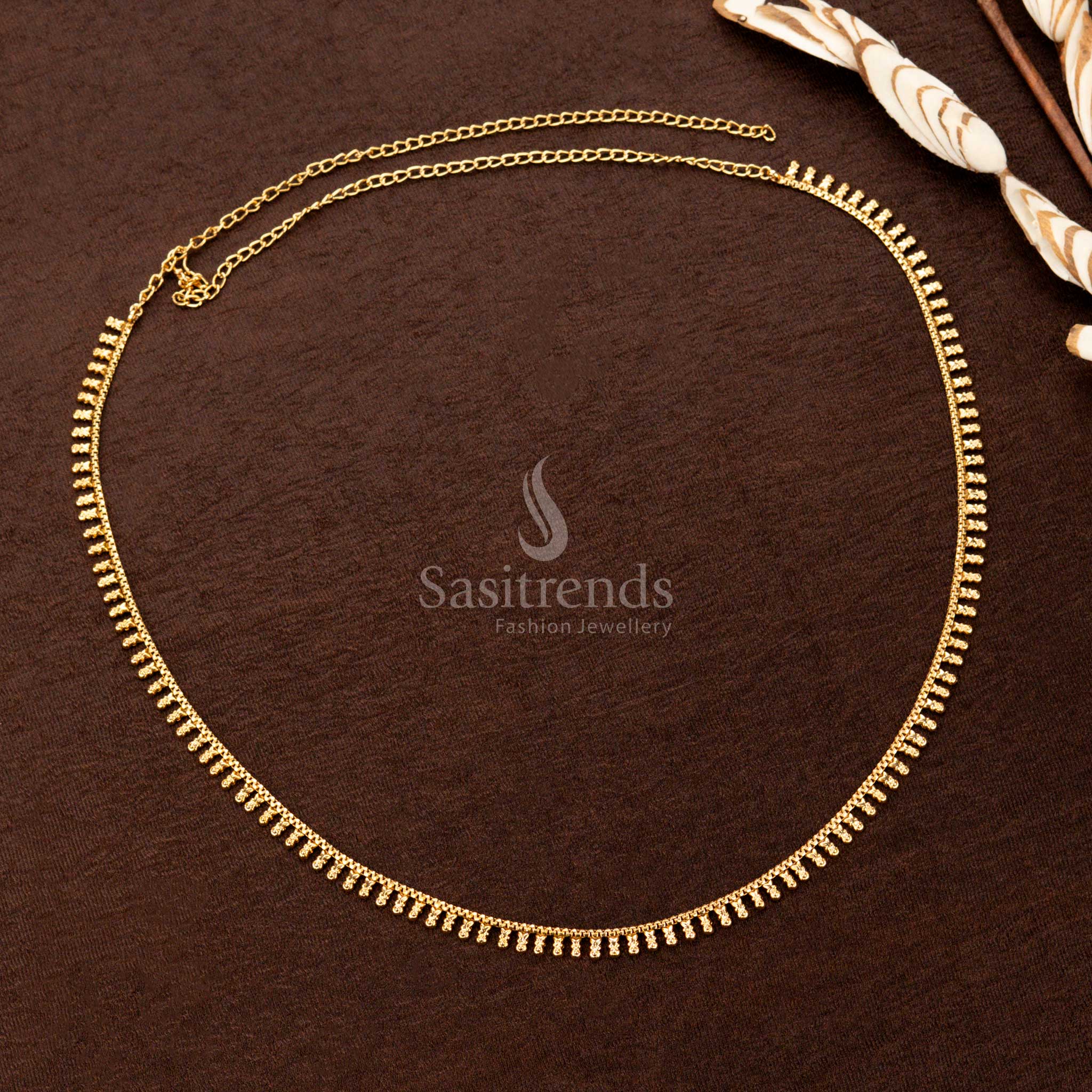Elegant gold plated hip chain with embossed flower-like dangles - Sasitrends