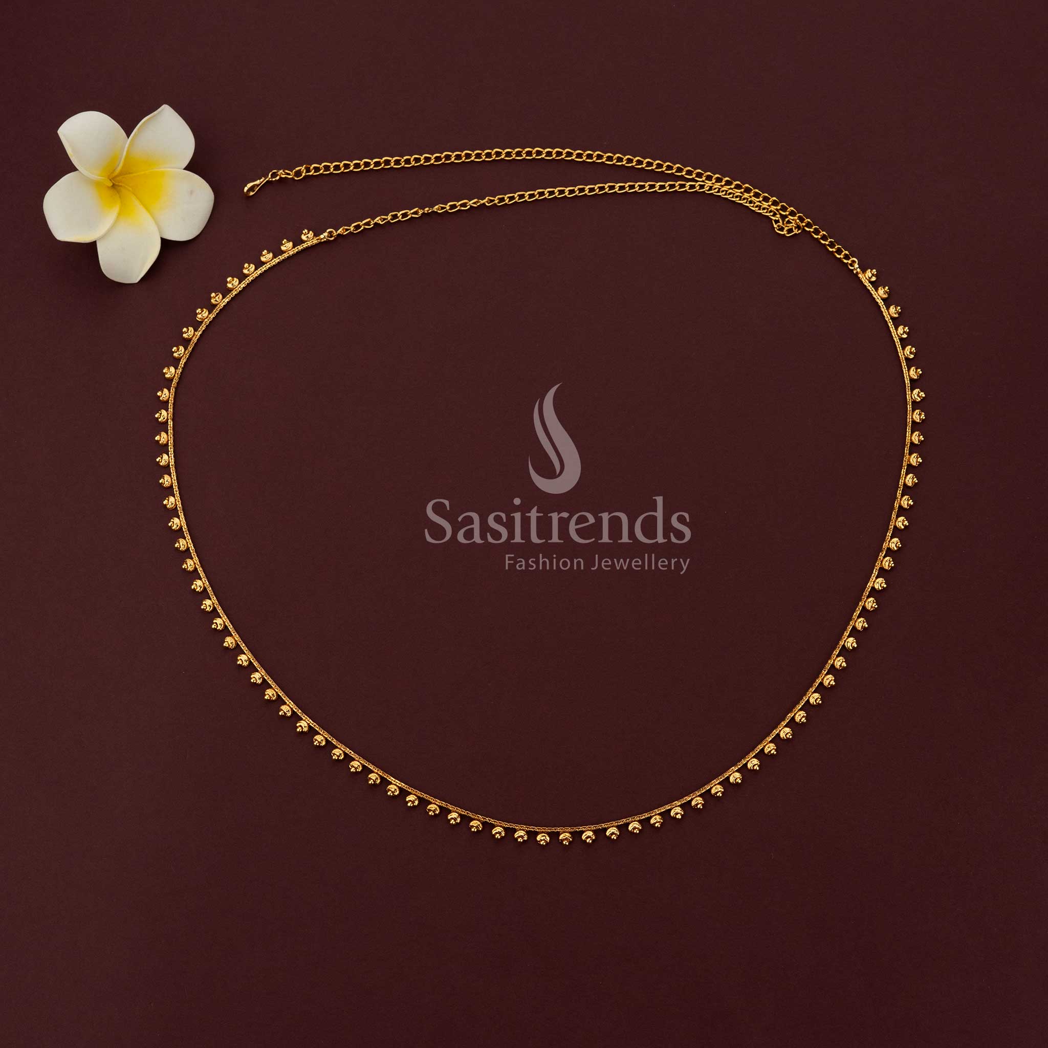 Adjustable gold waist chain with lobster clasp and extended links for a perfect fit - Sasitrends