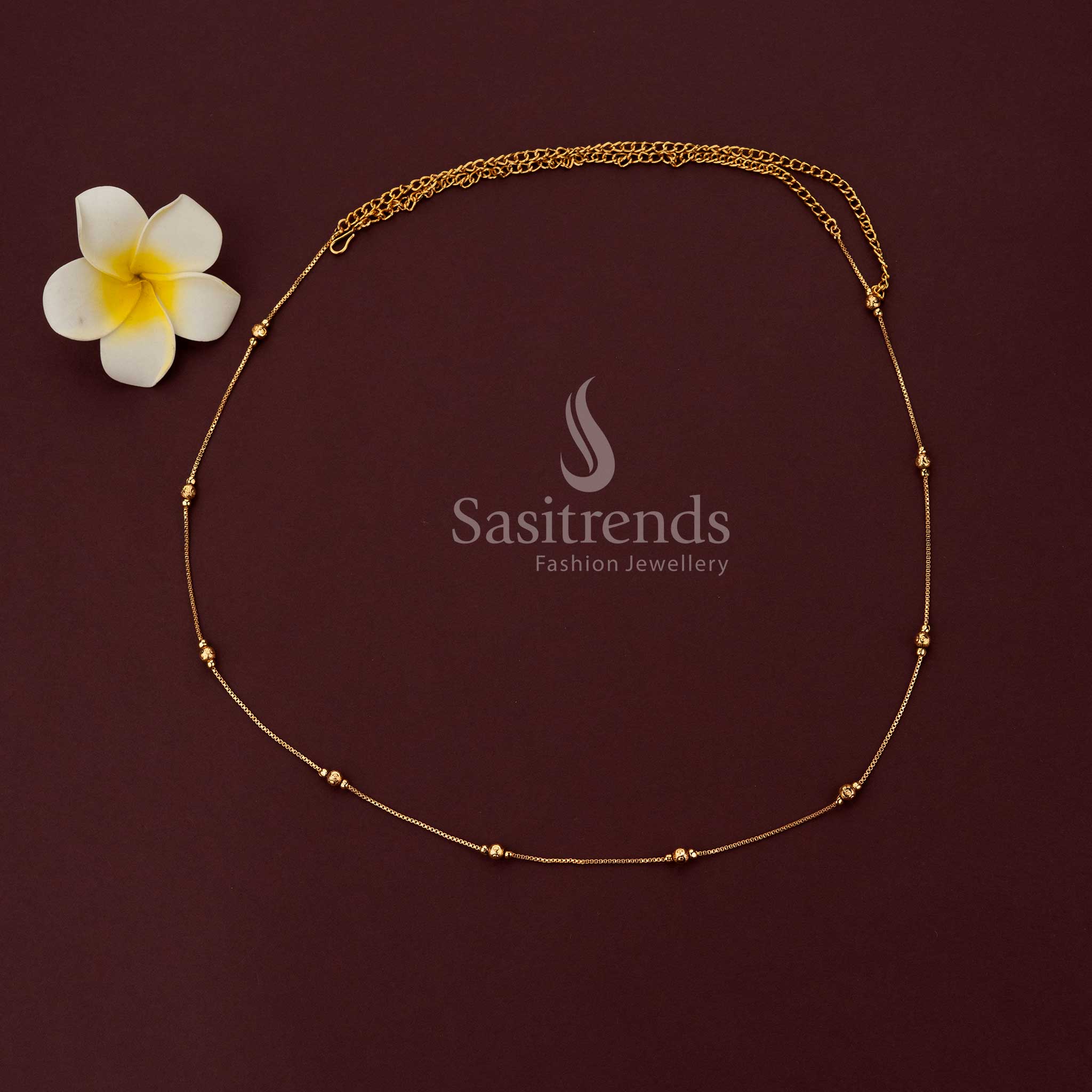 Elegant box chain kamarband with textured bead accents in premium gold plating sasitrends