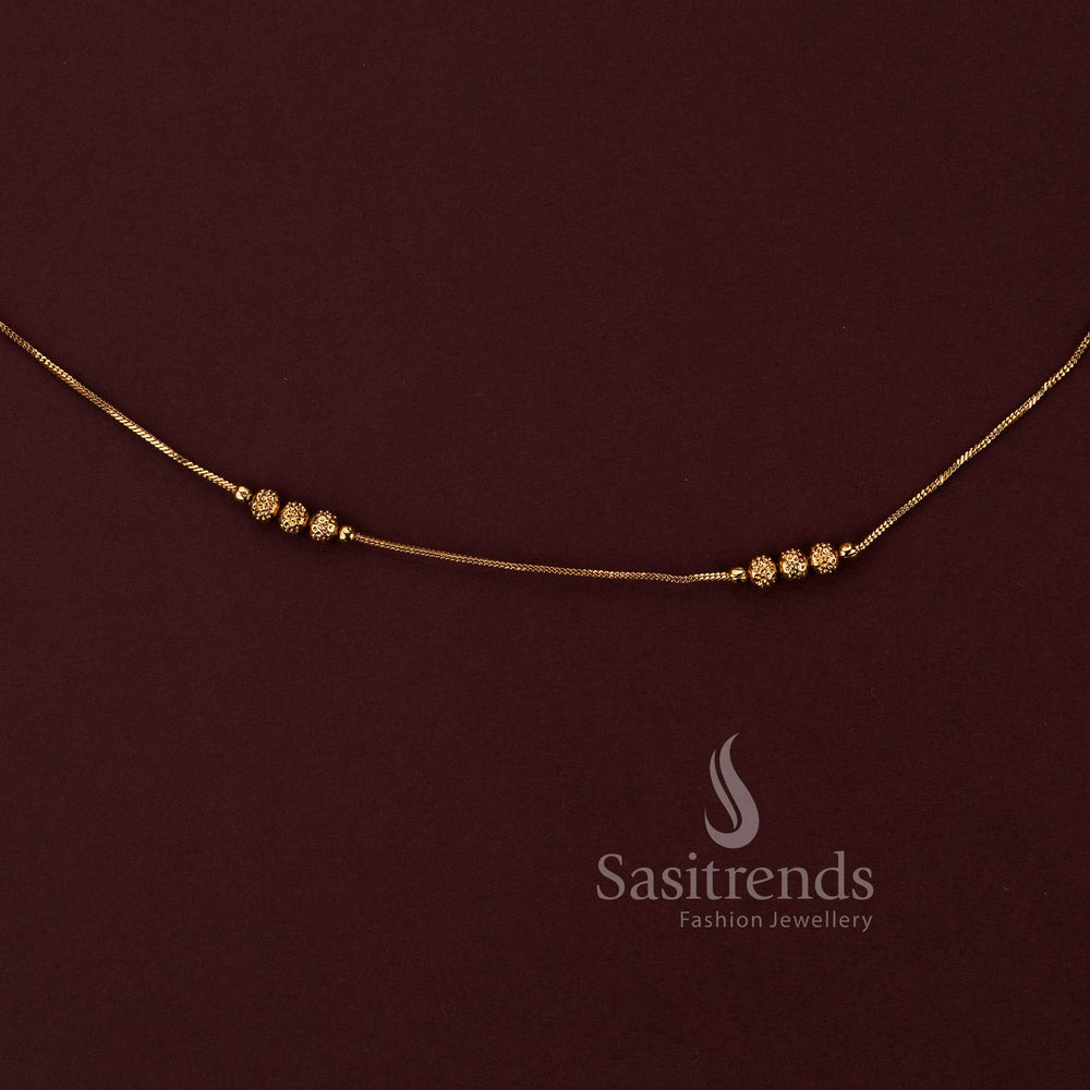 attractive antique gold finish saree waist chain with textured bead accents sasitrends 
