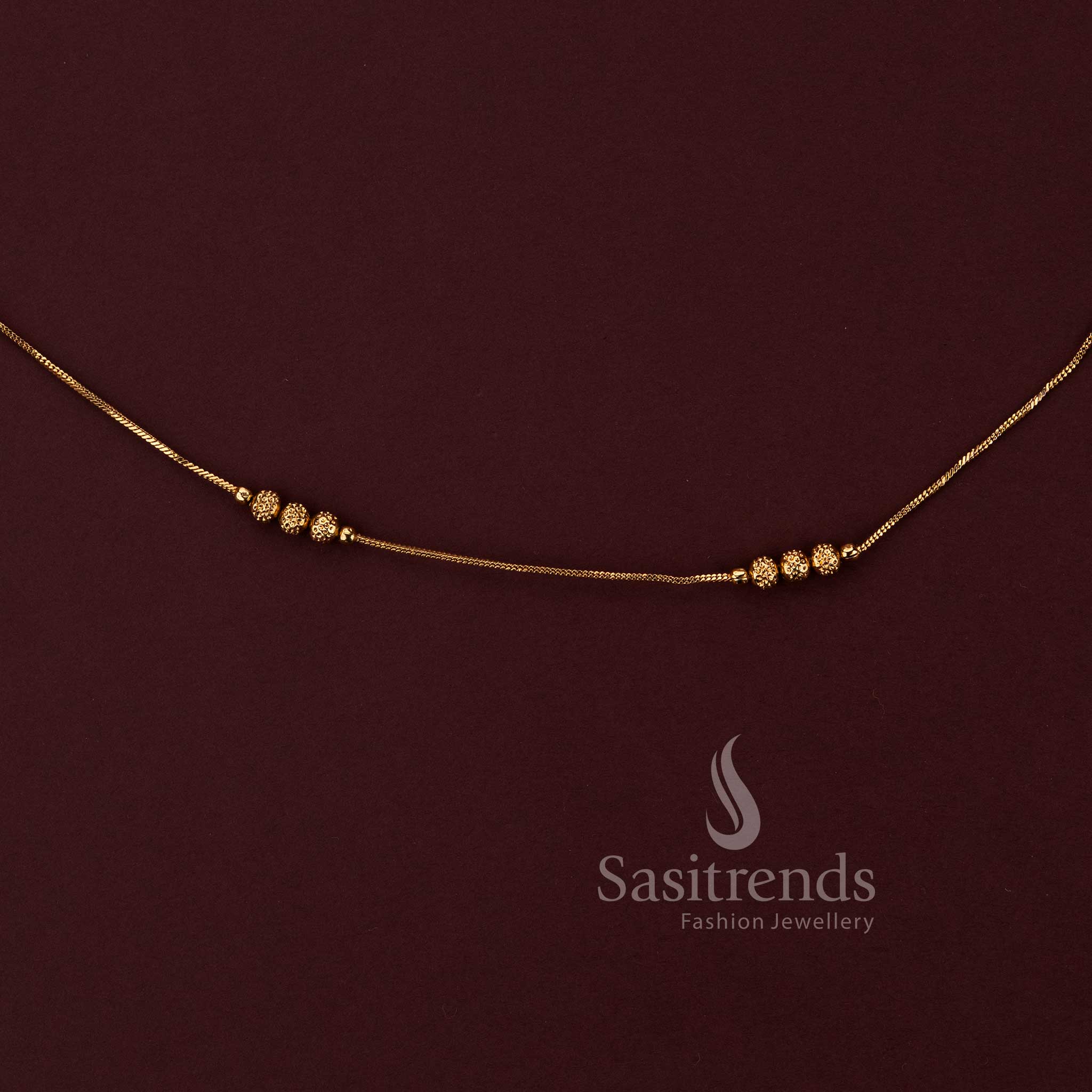 attractive antique gold finish saree waist chain with textured bead accents sasitrends 