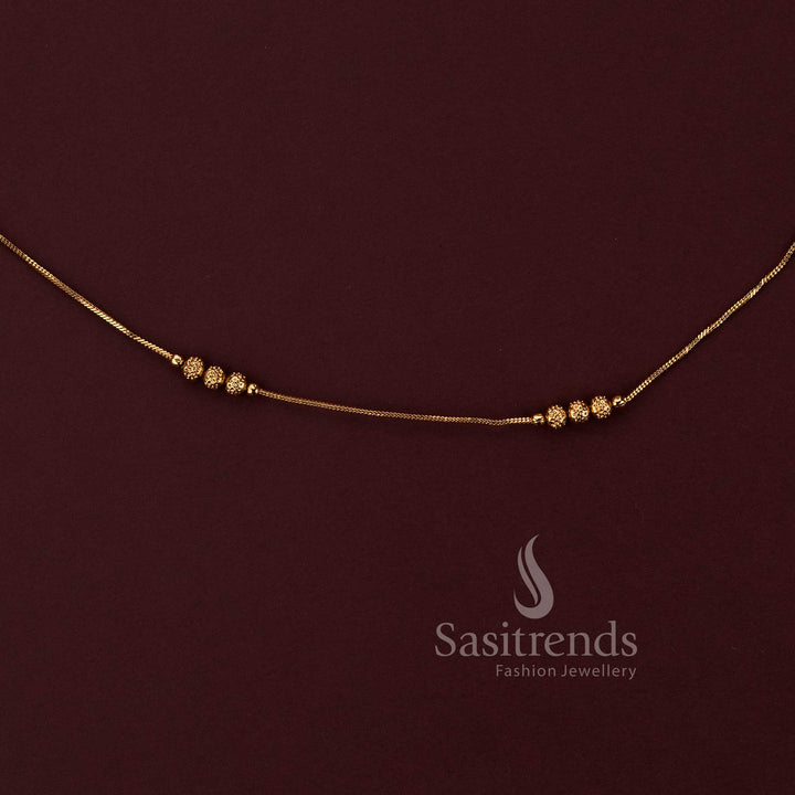 attractive antique gold finish saree waist chain with textured bead accents sasitrends 