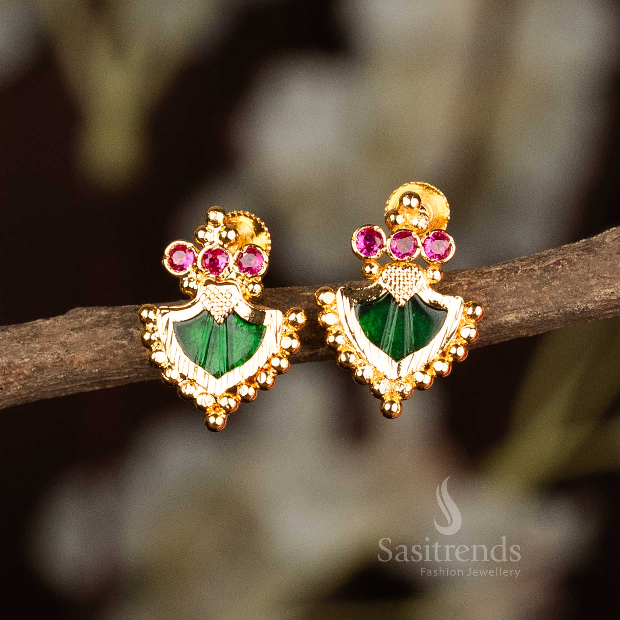 Green Palakka earrings with a straight-line trio of AD stones, crafted in micro gold plating and inspired by sacred Kerala temple jewellery artistry – vibrant ethnic statement from Sasitrends