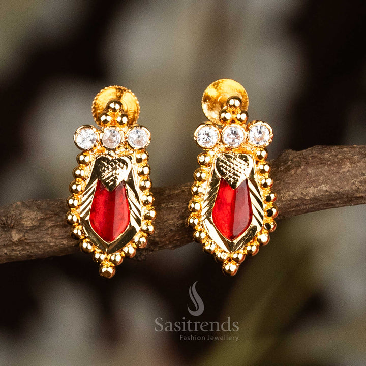 Traditional red Nagapadam Palakka earrings crafted in micro gold with a striking trio of American diamond head stones – divine Kerala temple jewellery with sacred styling by Sasitrends
