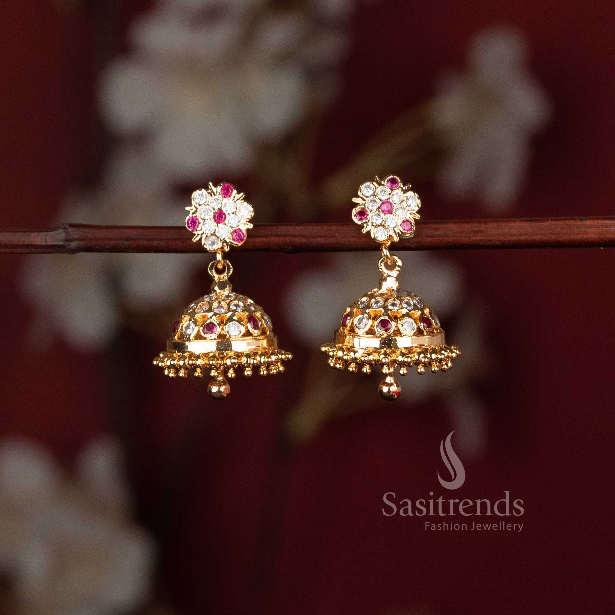 Elegant ruby and diamond floral jhumka earrings for wedding and festive wear - Sasitrends