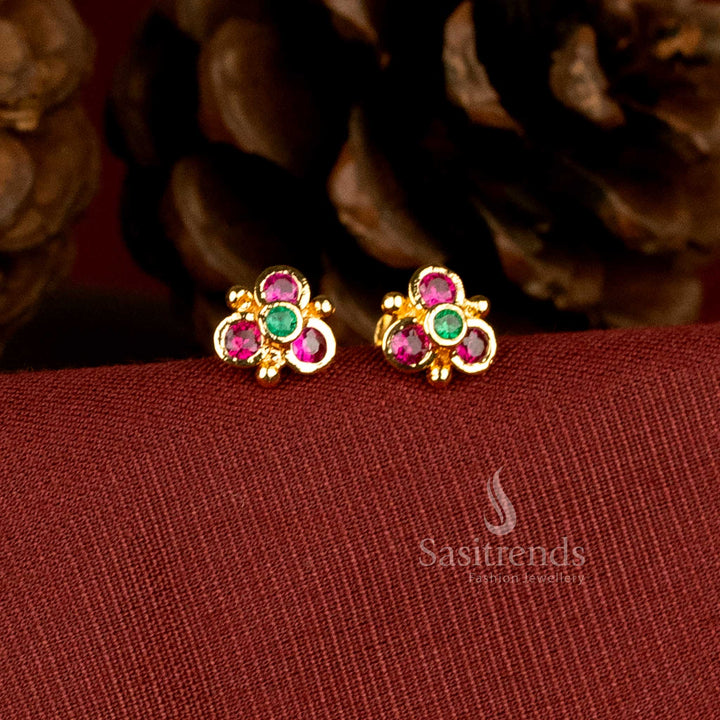 Gold look floral design stud earrings with AD stones by Sasitrends