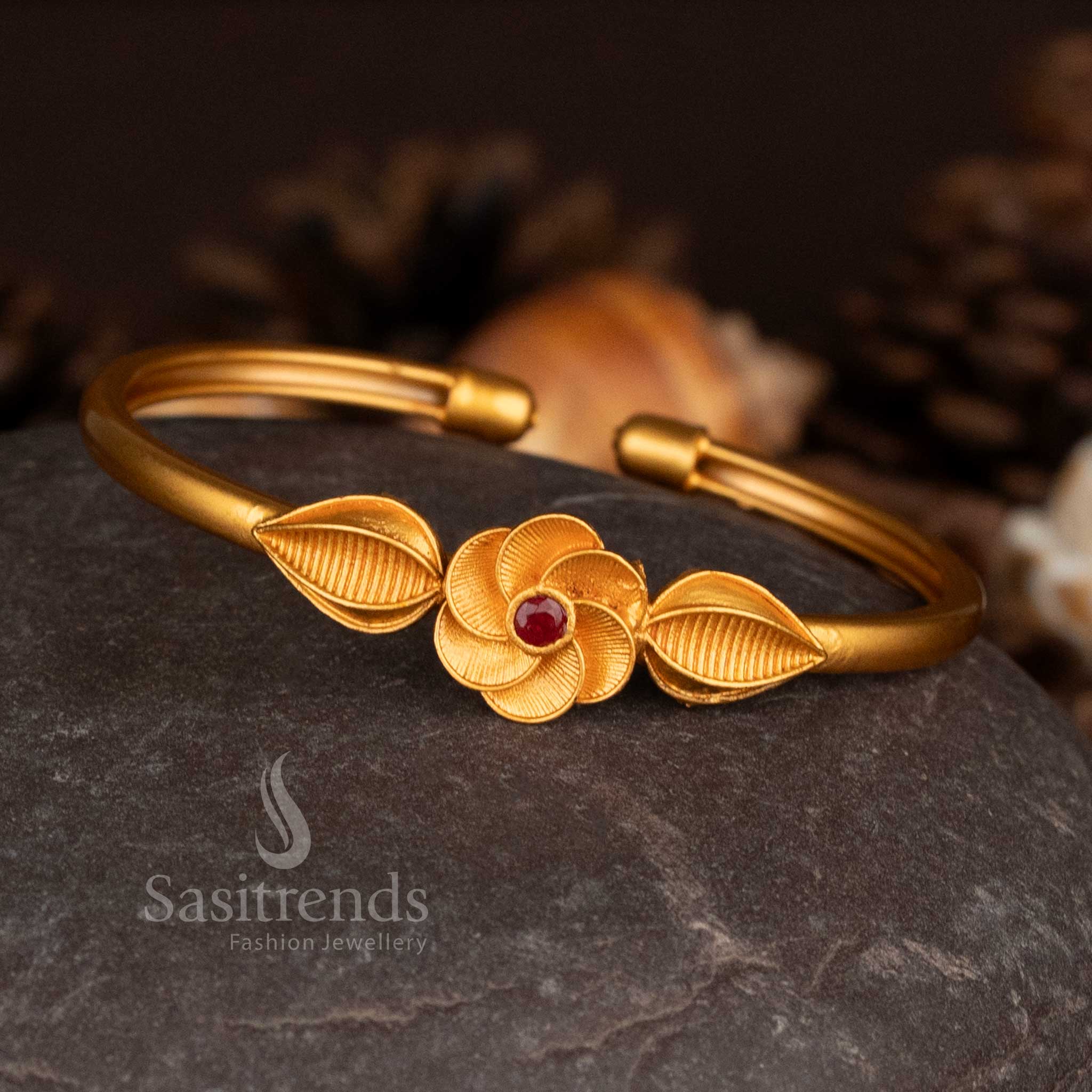 3.	Peacock inspired matte bracelet with ruby and green stone accents - Sasitrends