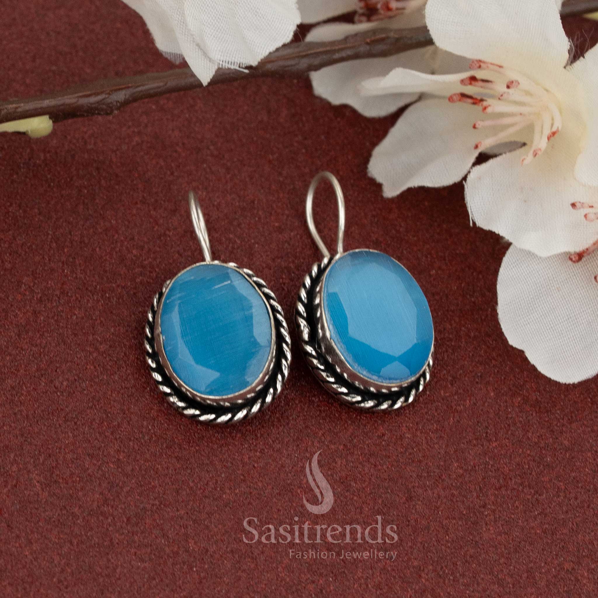 Chic oxidised fish hook earrings with soft sky-blue oval natural stone and twisted rope frame – ideal for light, breezy everyday fashion – Sasitrends