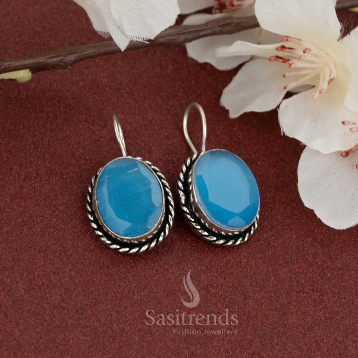Chic oxidised fish hook earrings with soft sky-blue oval natural stone and twisted rope frame – ideal for light, breezy everyday fashion – Sasitrends