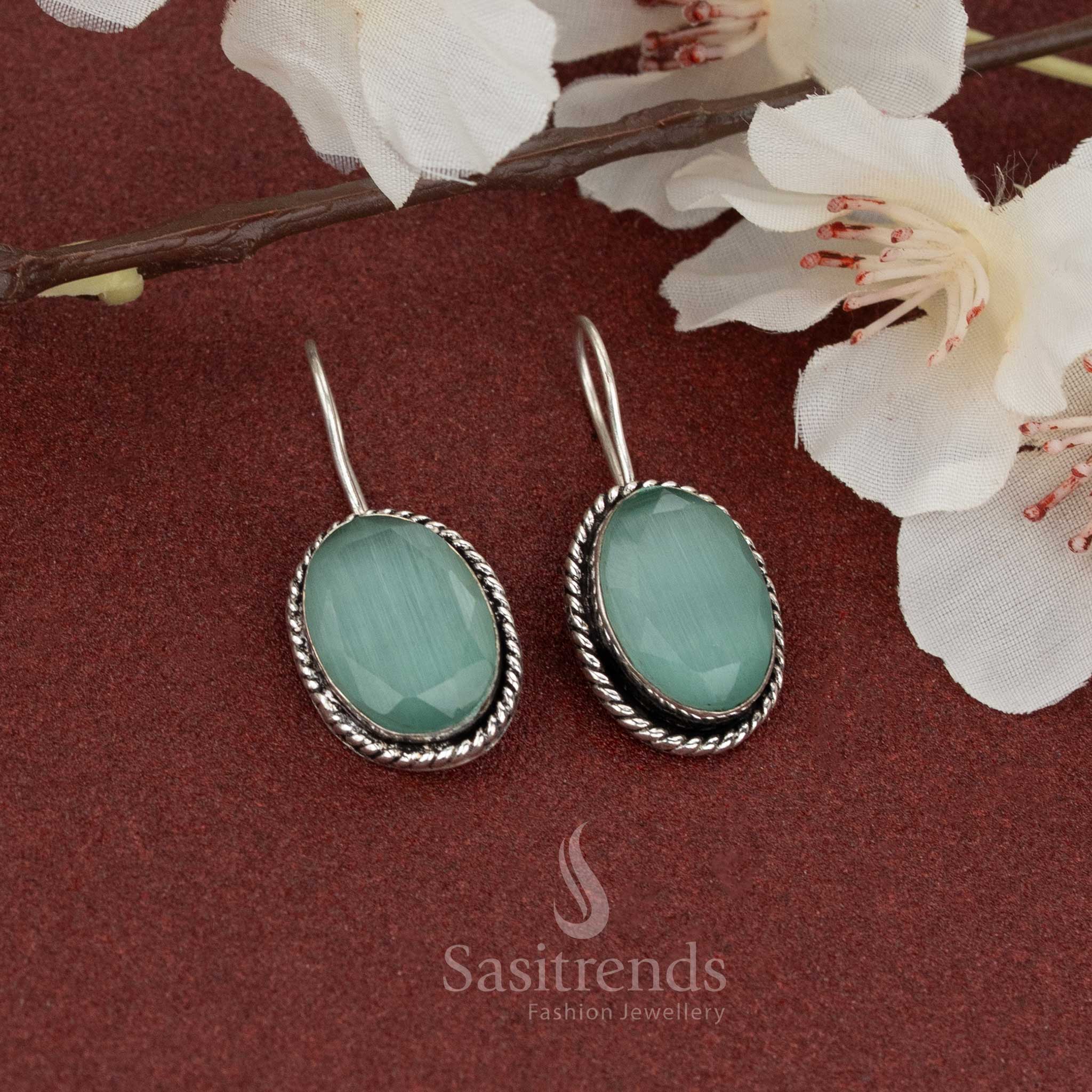 Refreshing mint green natural stone in oxidised oval earrings with fish hook and twisted border – perfect for cool-toned casual wear – Sasitrends