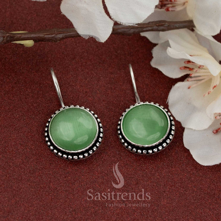 Elegant oxidised fish hook earrings with round green natural stone – a refreshing choice for workwear and day-to-day use – Sasitrends

