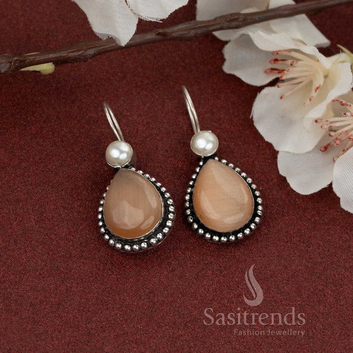 Elegant peach oxidised earrings with teardrop stone and pearl stud – subtle charm for festive outfits – Sasitrends
