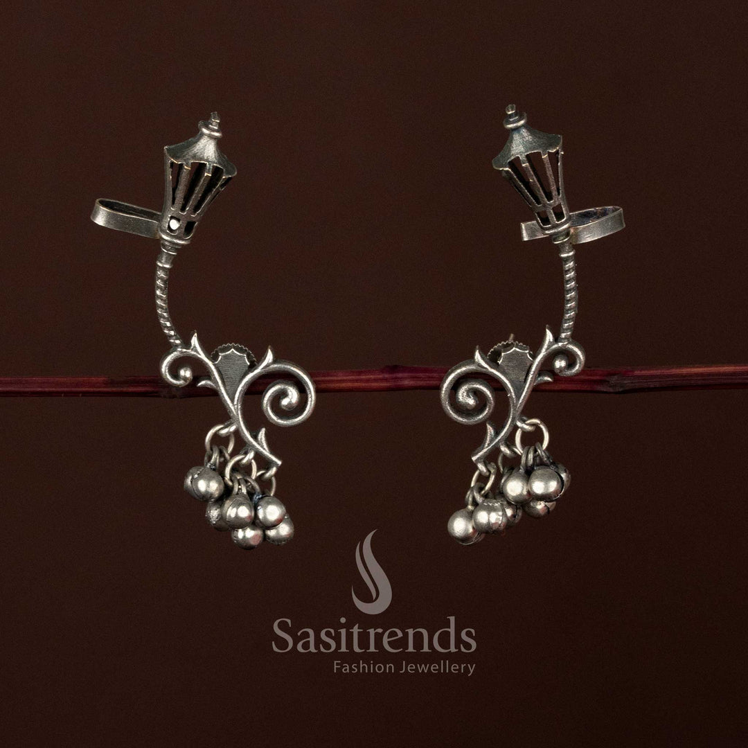 Sasitrends antique oxidised ear cuff earrings with scrollwork detailing above a carved lantern motif and multiple dangling bead clusters
