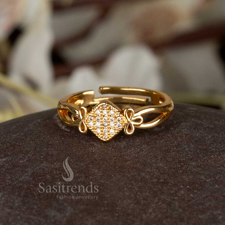 Designer adjustable ring in 24 carat micro gold plated finish, embedded with crystal-cut American Diamonds – perfect blend of sophistication in jewellery from Sasitrends