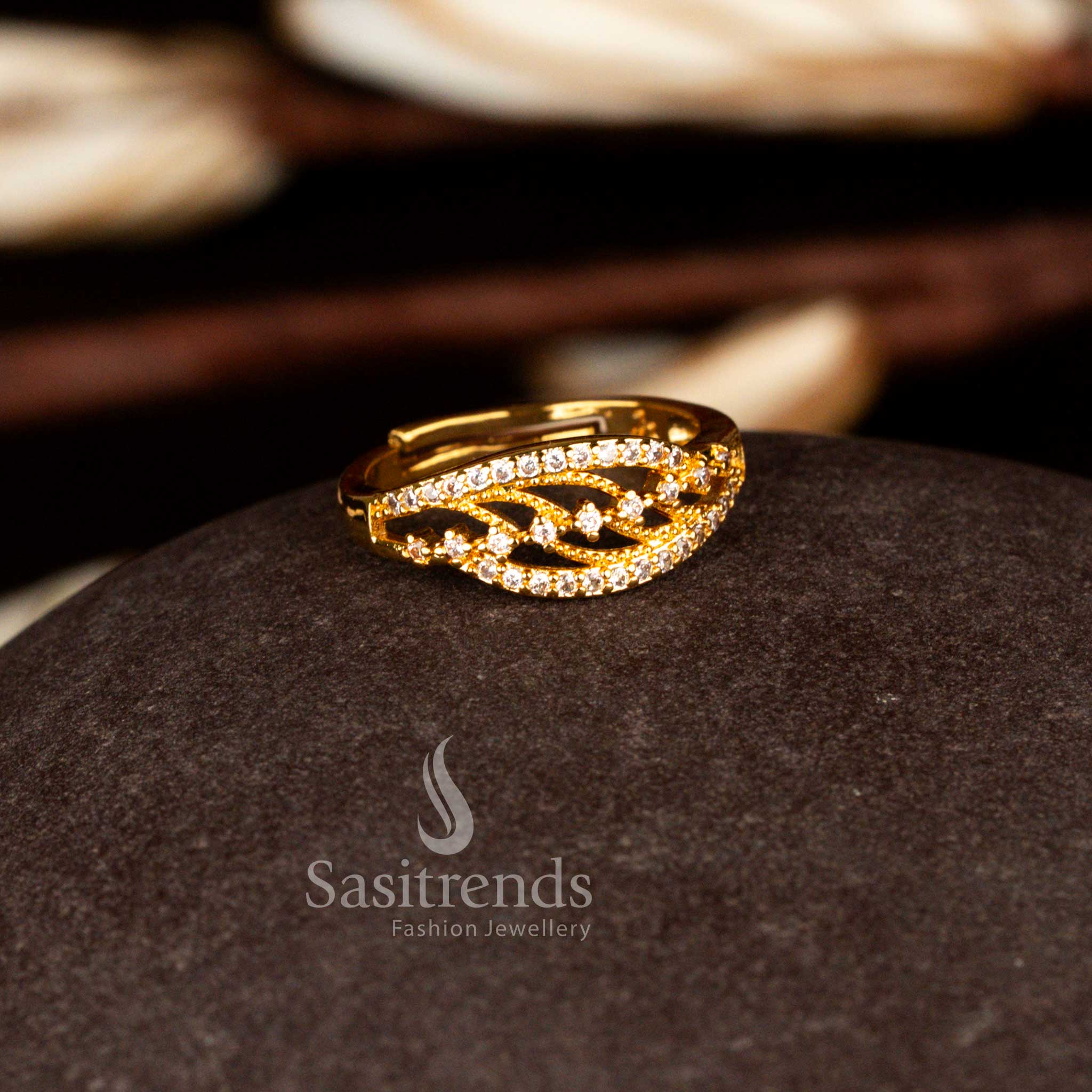 Sasitrends everyday one gram micro gold plated adjustable filigree-style white AD stone ring featuring a smooth adjustable band and premium gold finish that resembles real gold jewellery.