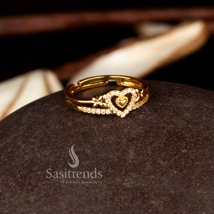 Sasitrends classic one gram micro gold plated adjustable dual heart motif white AD statement ring featuring a polished gold tone finish and refined stone setting ideal for party and ethnic wear.