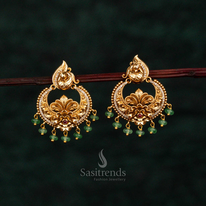 Majestic Peacock Matte Gold Plated Crescent Floral AD Temple Earrings for Festivals